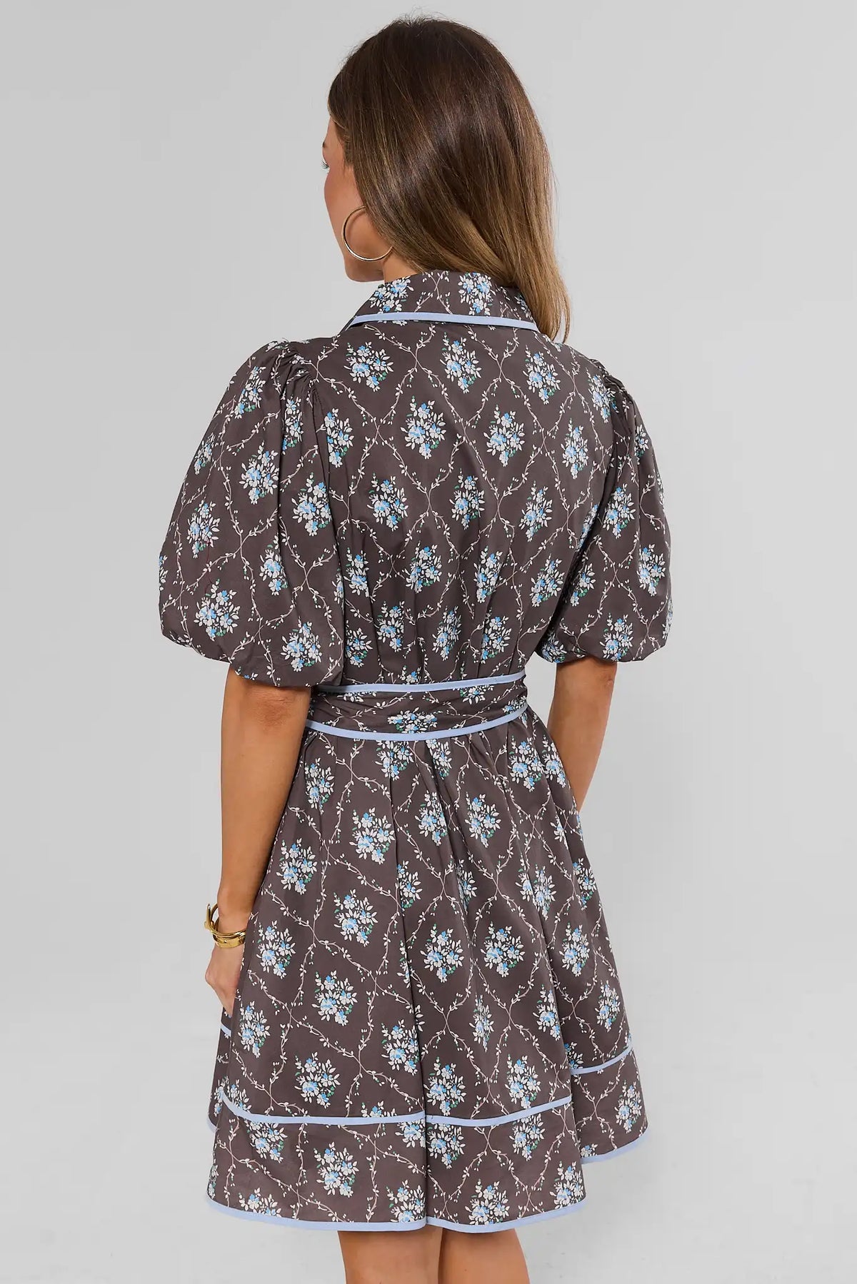 Brown Floral Print Short Dress with Blue Piping and Tie Waist - Back View On Model | Avara
