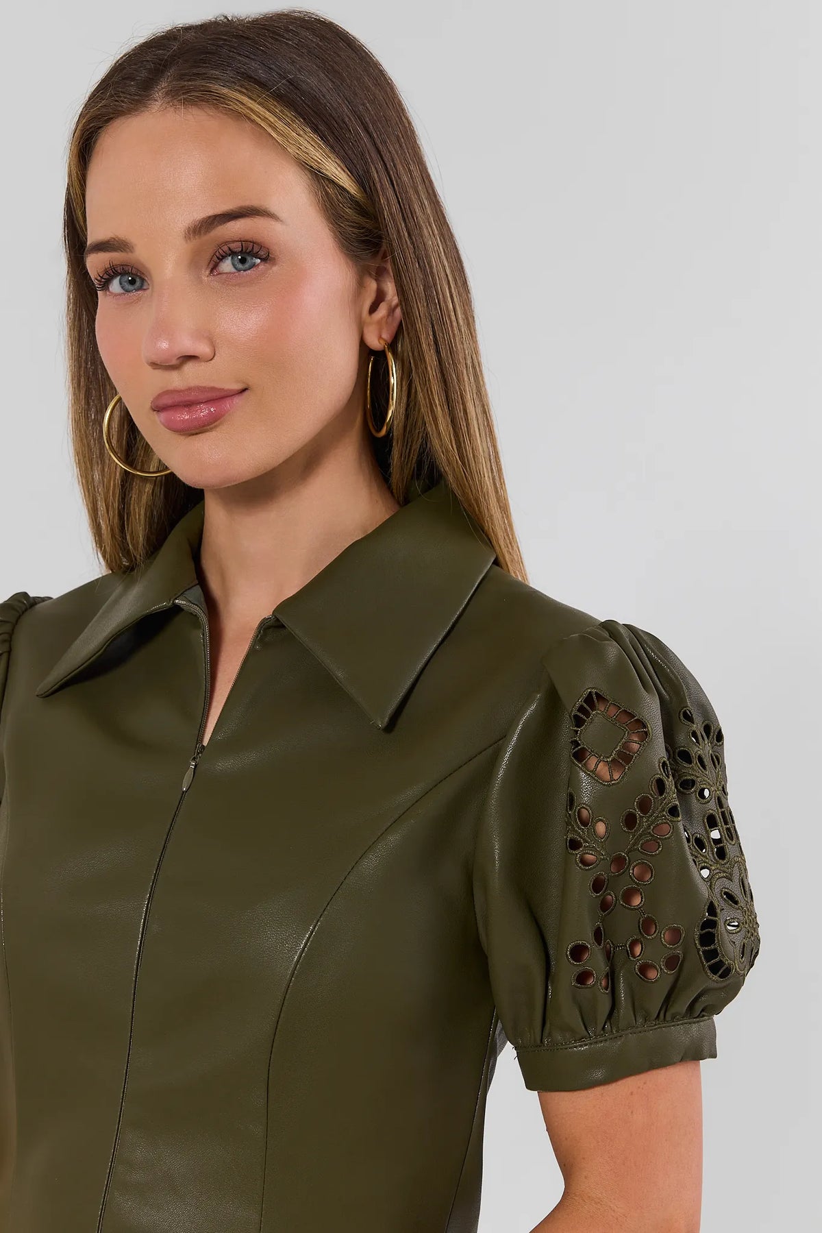 Green Faux Leather Short Dress - Close-Up Collar and Eyelet Sleeve Detail | Avara