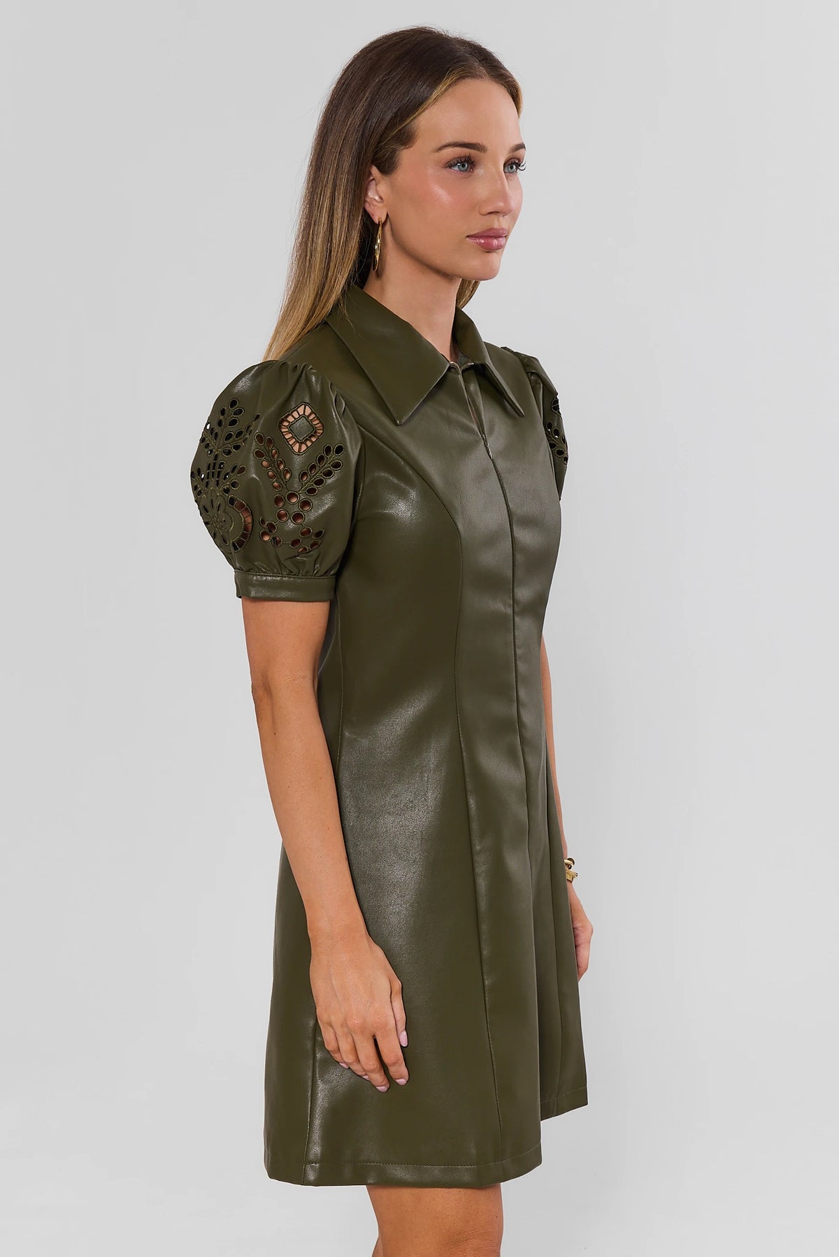 Green Faux Leather Zip-Up Short Dress - Side View, Puff Eyelet Sleeves | Avara