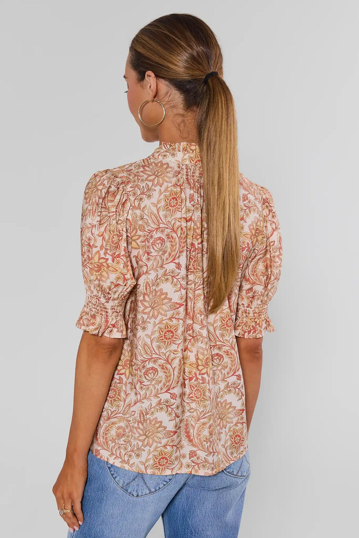 Cream Floral Printed Button-Up Top puff sleeves smocked cuffs - Back View On Model | Avara