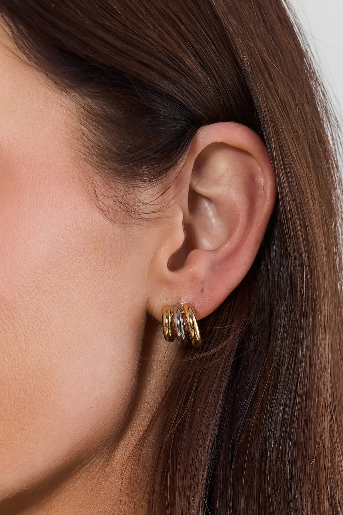 Gold Mixed Metal Chunky Hoop Earrings - On Model Ear Close-Up | Avara