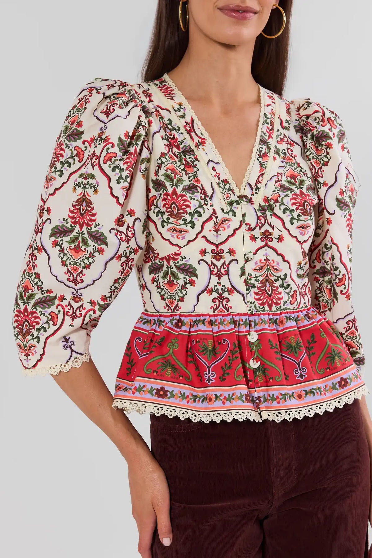 Ivory Floral Printed Peplum Top - Side Angle On Model | Avara