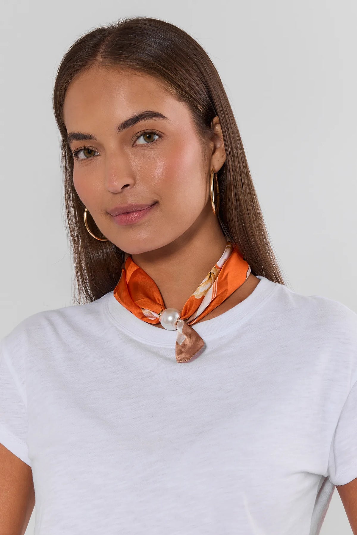 Orange Floral Magnetic Pearl Scarf Styled at Neck on Model - Front View | Avara