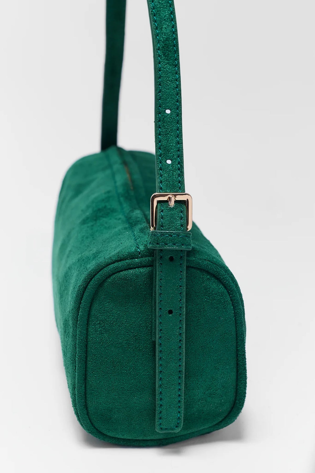 Green Faux Suede Barrel Bag - Side View with Adjustable Gold Buckle Strap | Avara
