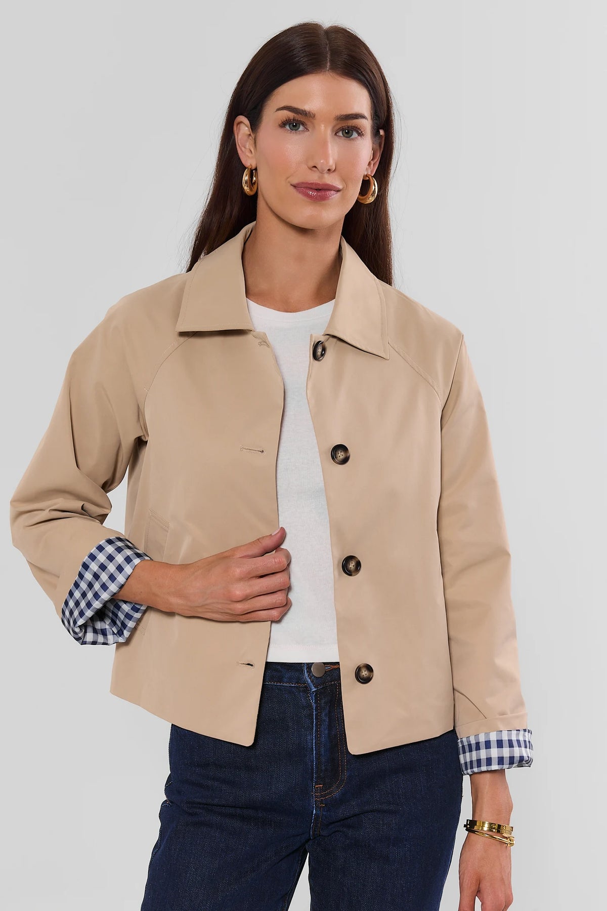 Tan Short Trench Jacket with button front and gingham cuffs - Front View On Model | Avara