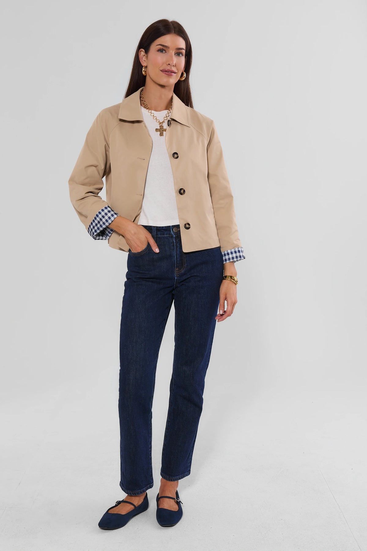 Tan Short Trench Jacket over dark denim - Full Length Front View On Model | Avara