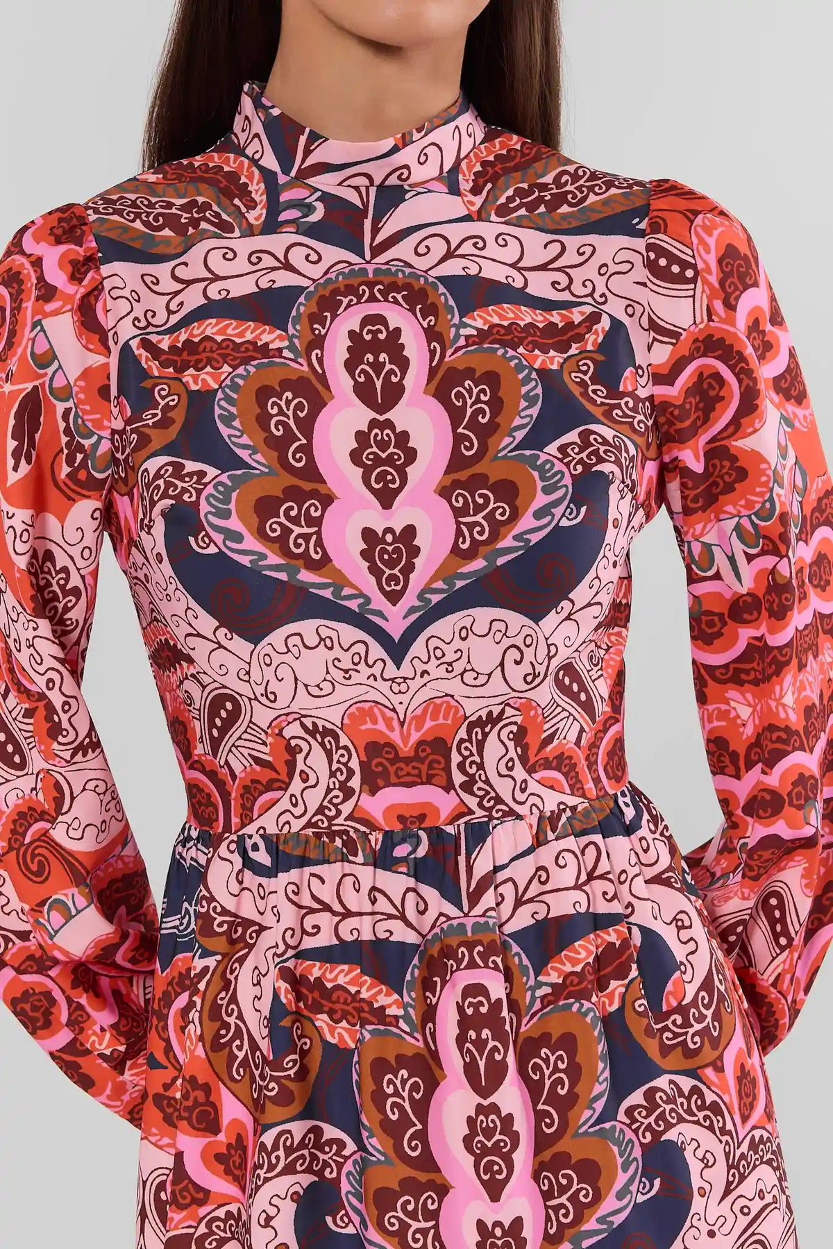 Pink Printed Modest Maxi Dress - Full Front View, Long Sleeves, Tiered Hem & Tan Boots | Avara