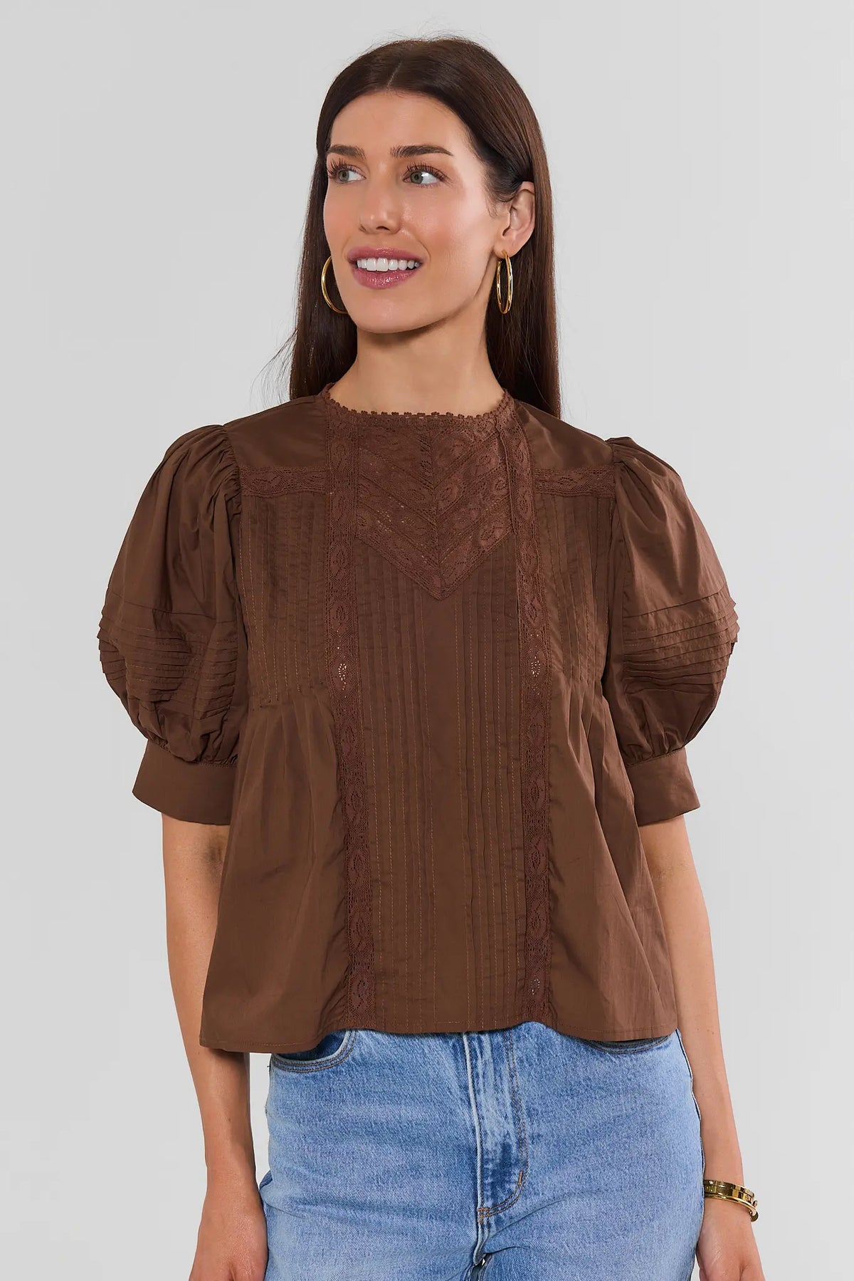 Brown Puff Sleeve Lace Pleated Top - Front View Styled with Light Wash Jeans | Avara