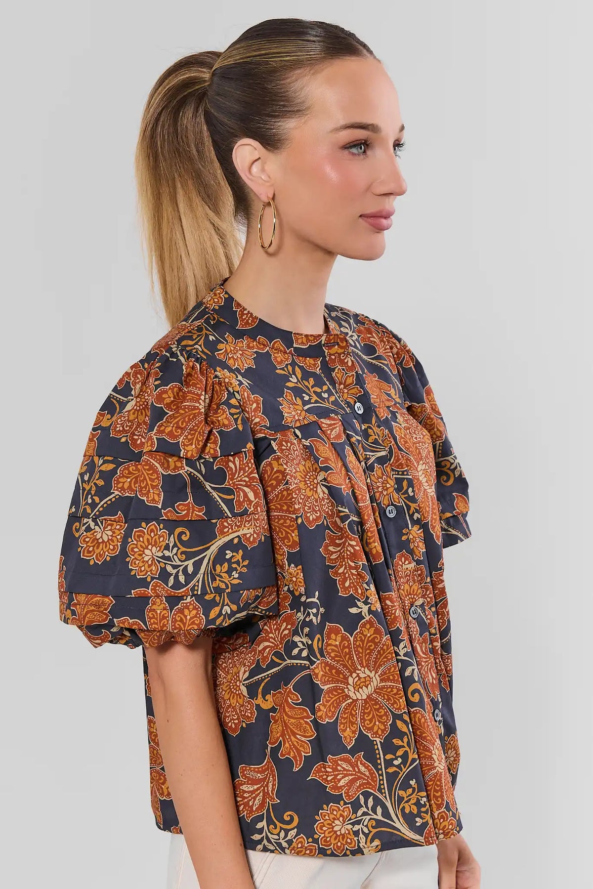 Navy Floral Printed Puff Sleeve Button-Up Top - Side Profile Showing Sleeve Volume | Avara
