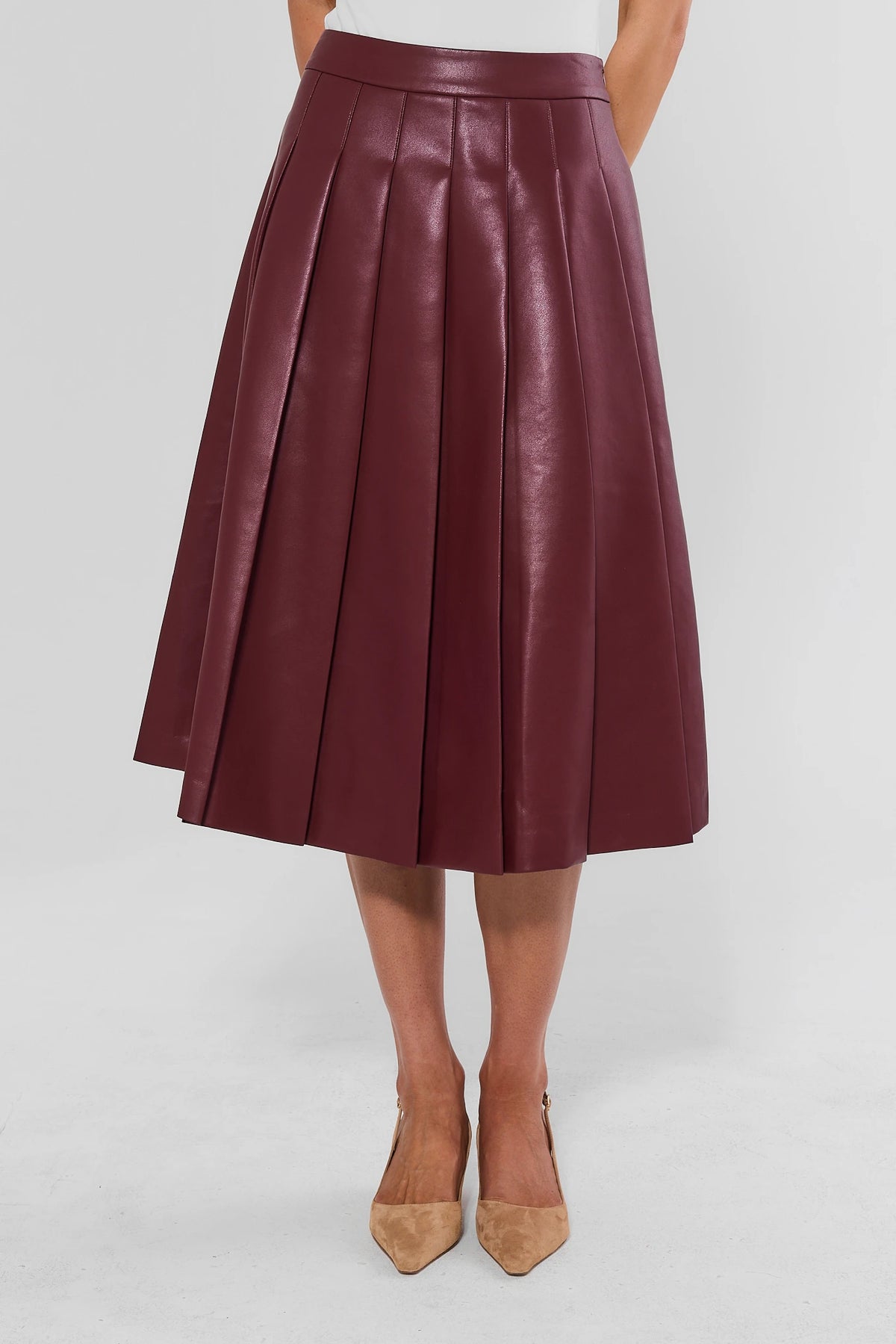 Maroon Faux Leather Pleated Midi Skirt - Front View On Model | Avara