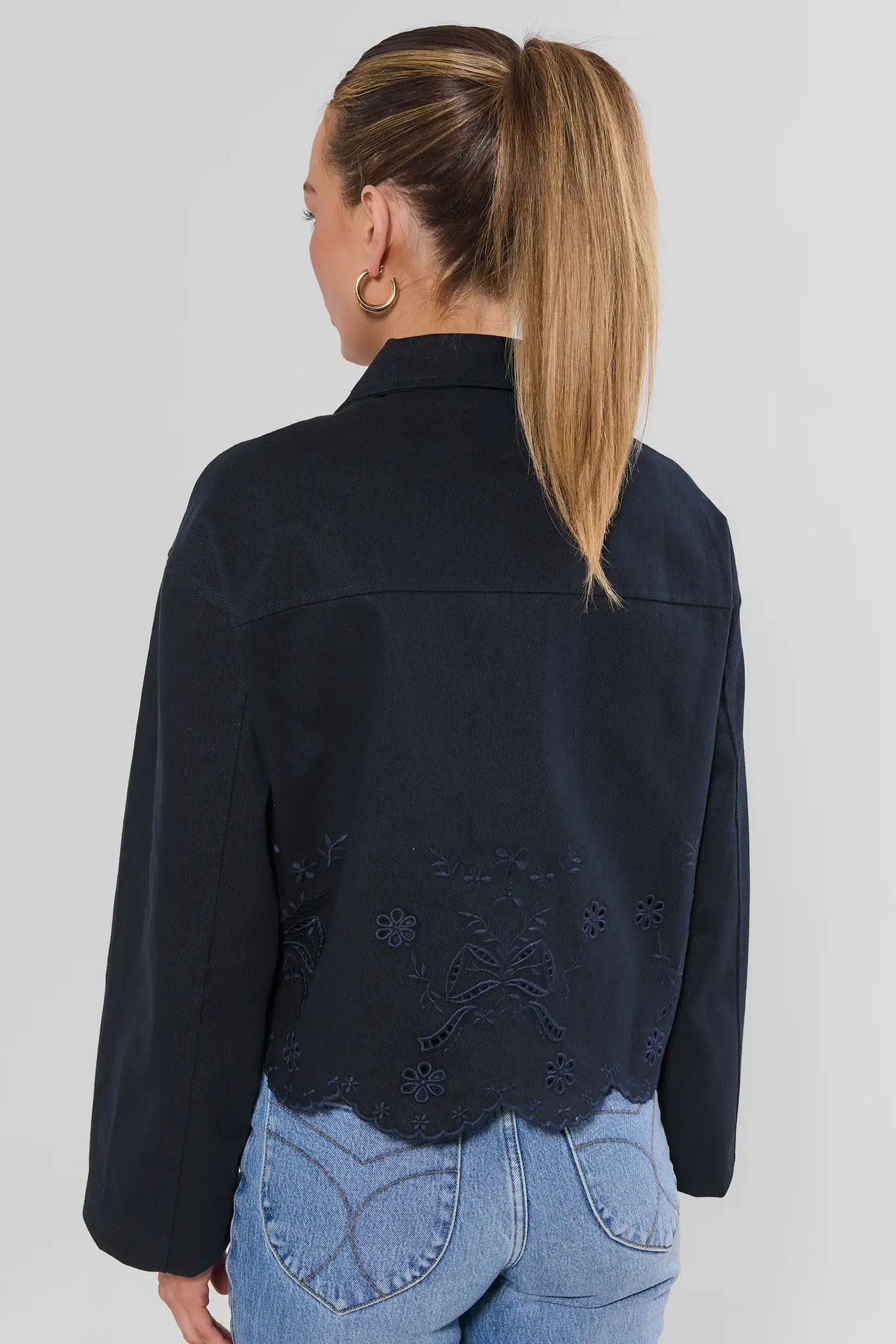 Navy Cotton Eyelet Jacket - Back View Showing Scalloped Hem Detail | Avara