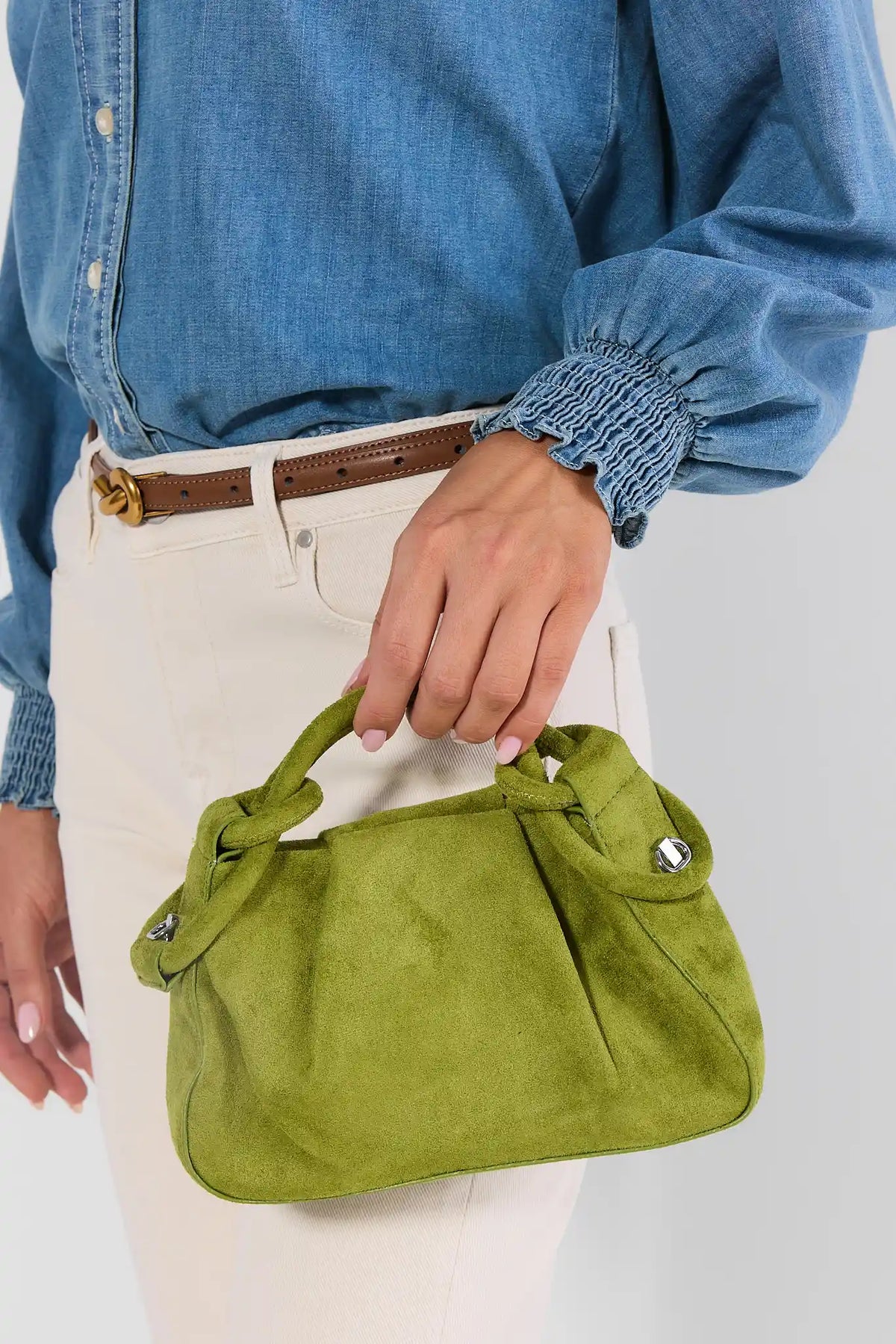 Chartreuse Faux Suede Handbag Held by Top Handle - On Model Close-Up | Avara
