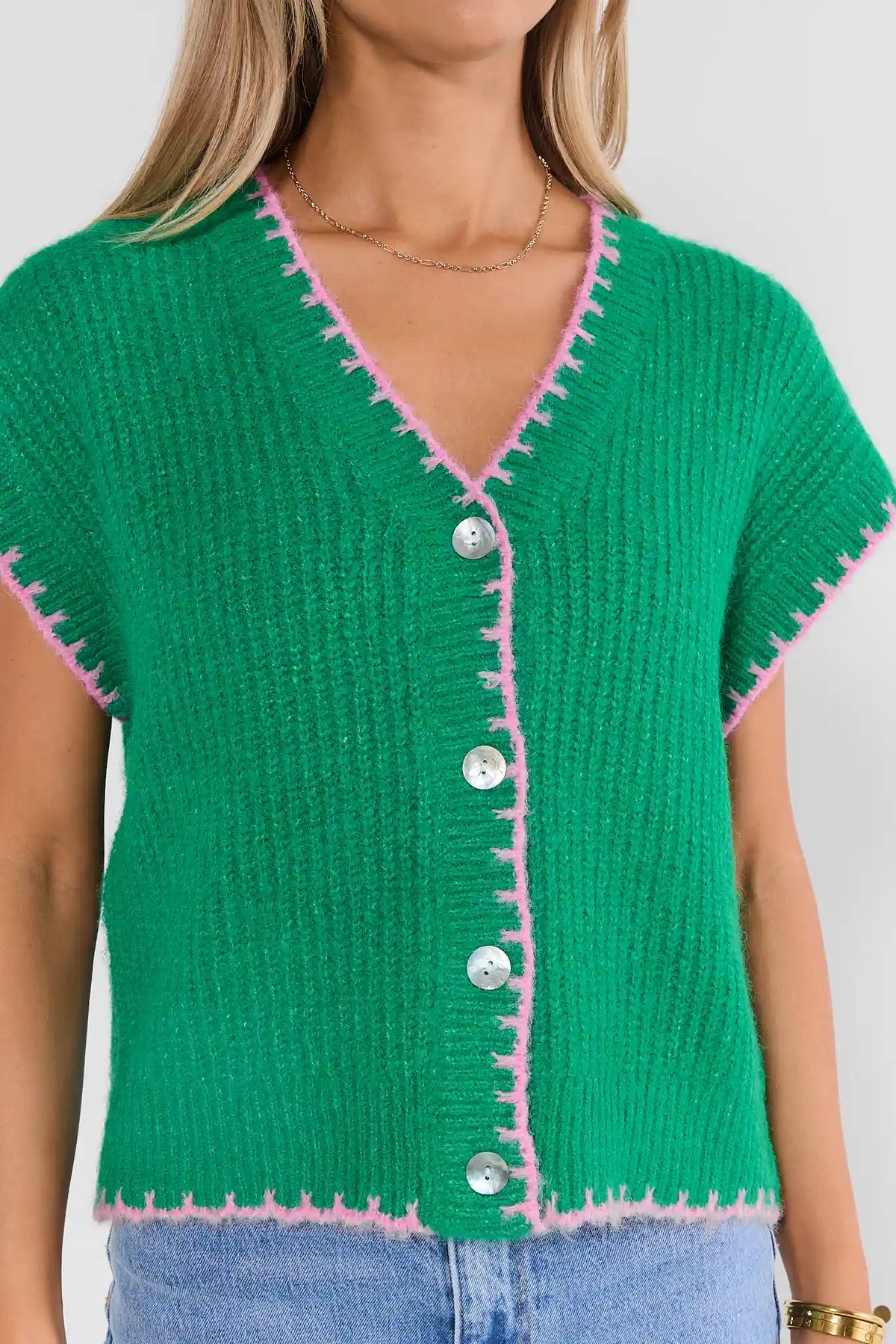 Green Sweater Vest Pink Contrast Trim and Pearl Buttons - Close-Up Detail | Avara