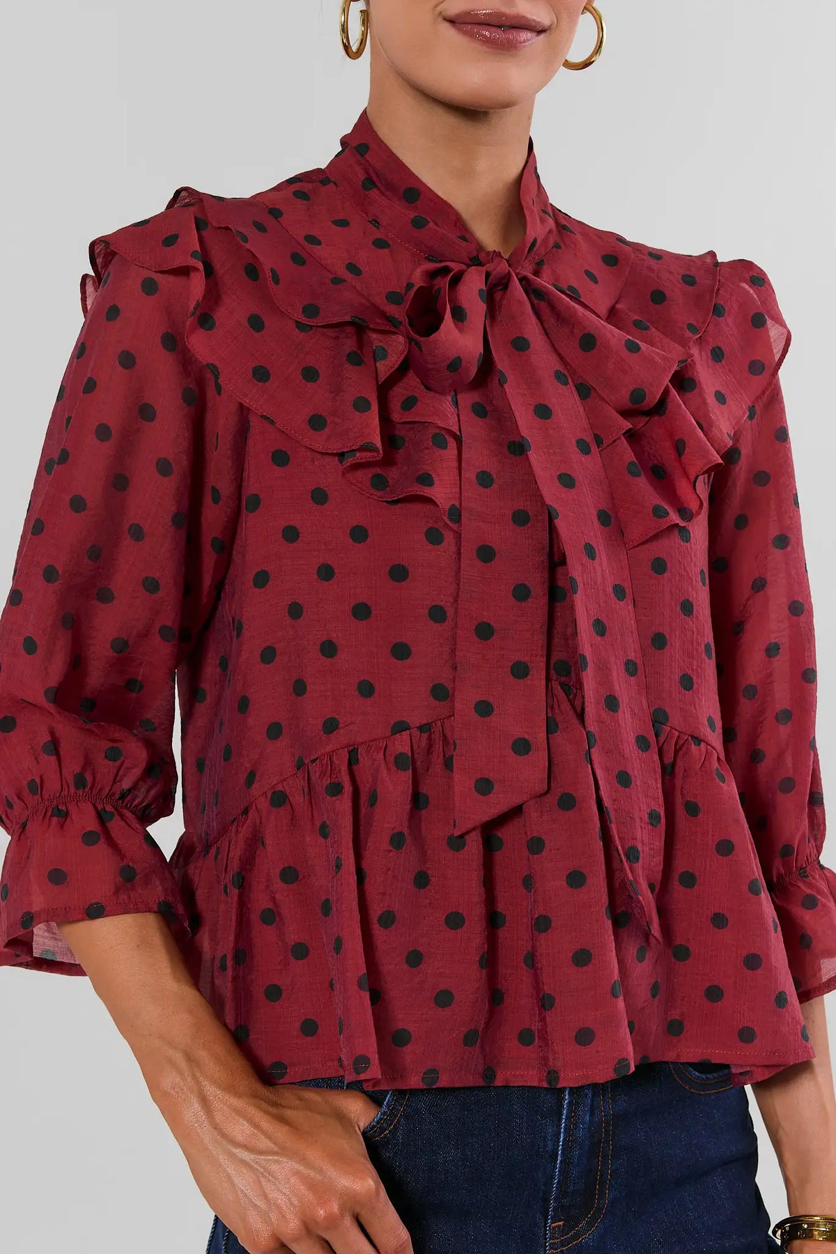Red Polka Dot Ruffle Top - Close-Up Front Detail, Tie Neck & Ruffle Bib | Avara