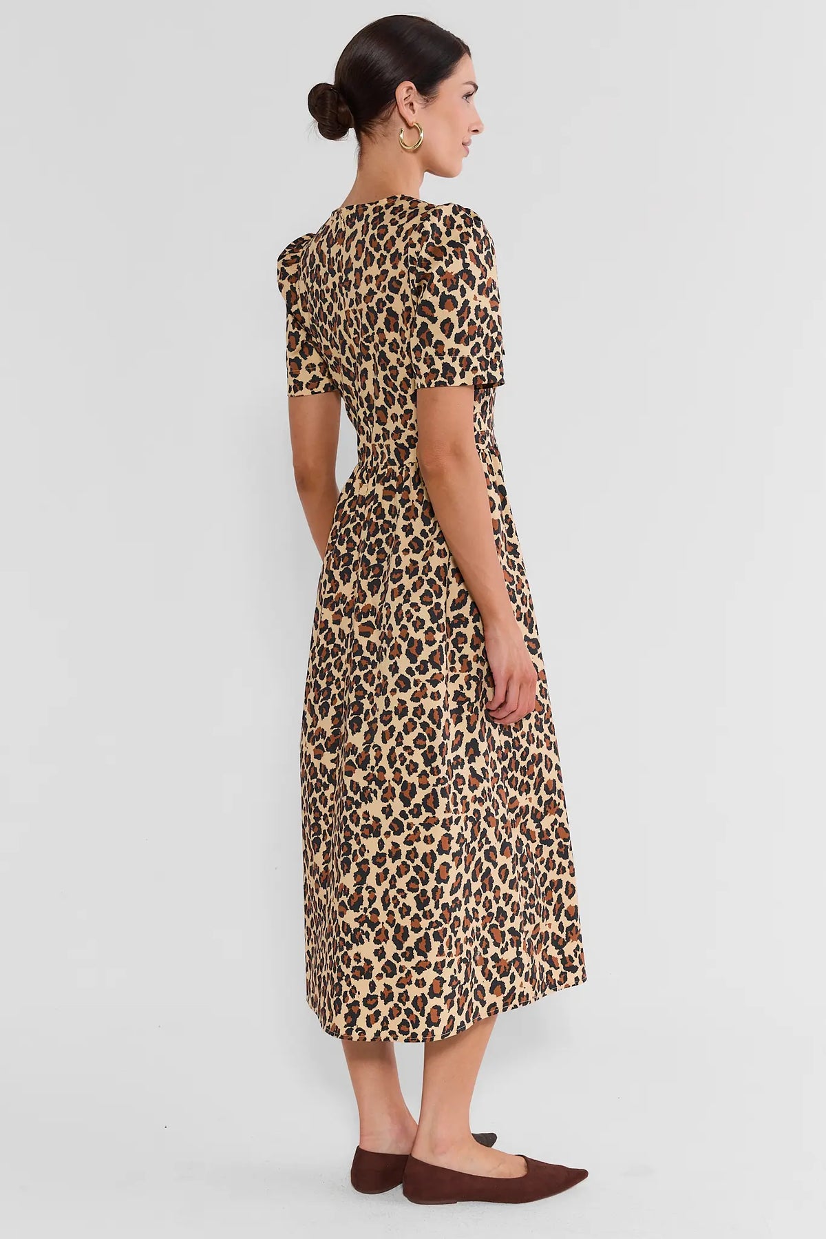 Tan Leopard Print Midi Dress - Back View Showing Pleated Skirt & Fitted Waist | Avara