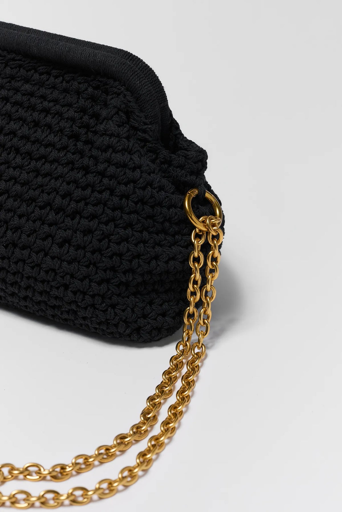 Black Woven Crossbody Bag Gold Chain Strap Hardware Close-Up Detail | Avara
