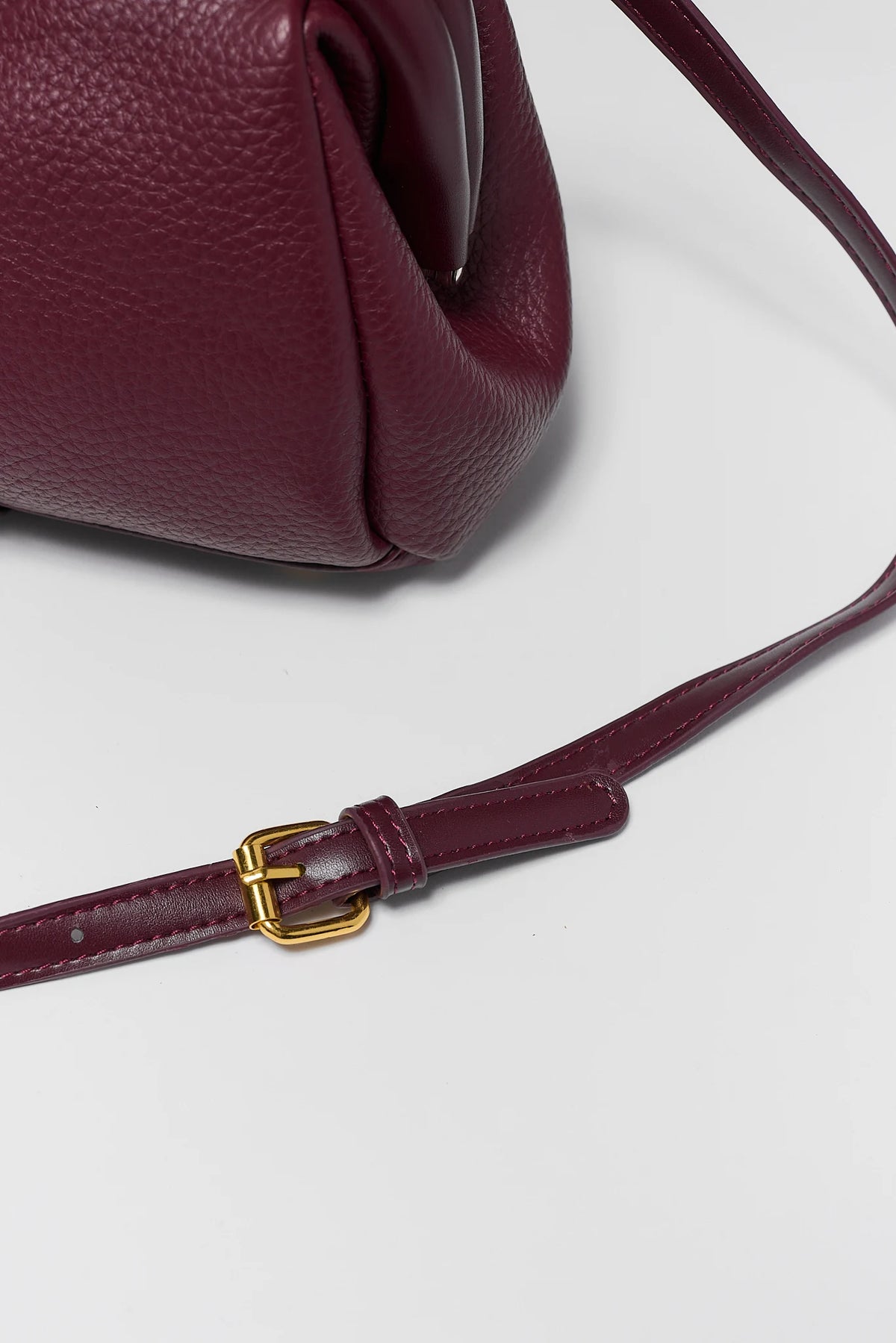 Burgundy Faux Leather Crossbody Bag - Adjustable Gold Buckle Strap Detail | Avara
