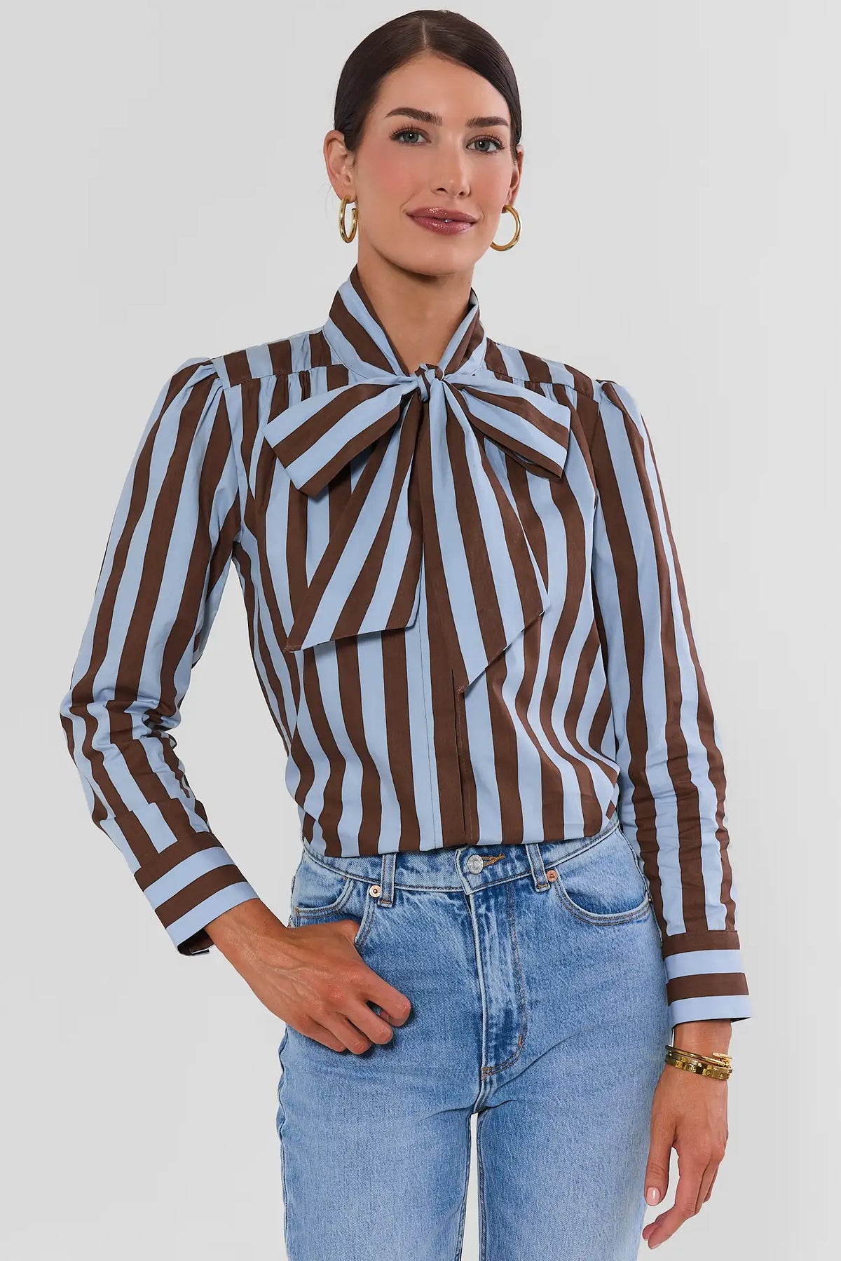 Brown Contrast Stripe Tie Neck Top - Front View Styled with Jeans | Avara