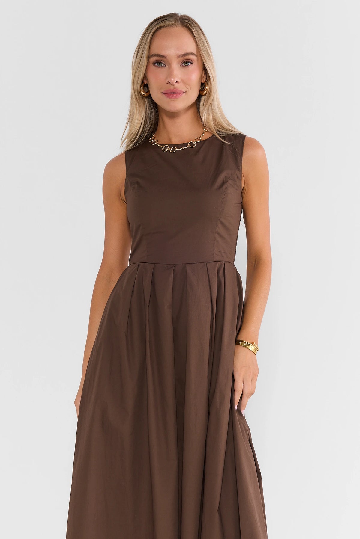 Brown Cotton Pleated Midi Dress - Front Crop View with Gold Jewelry | Avara