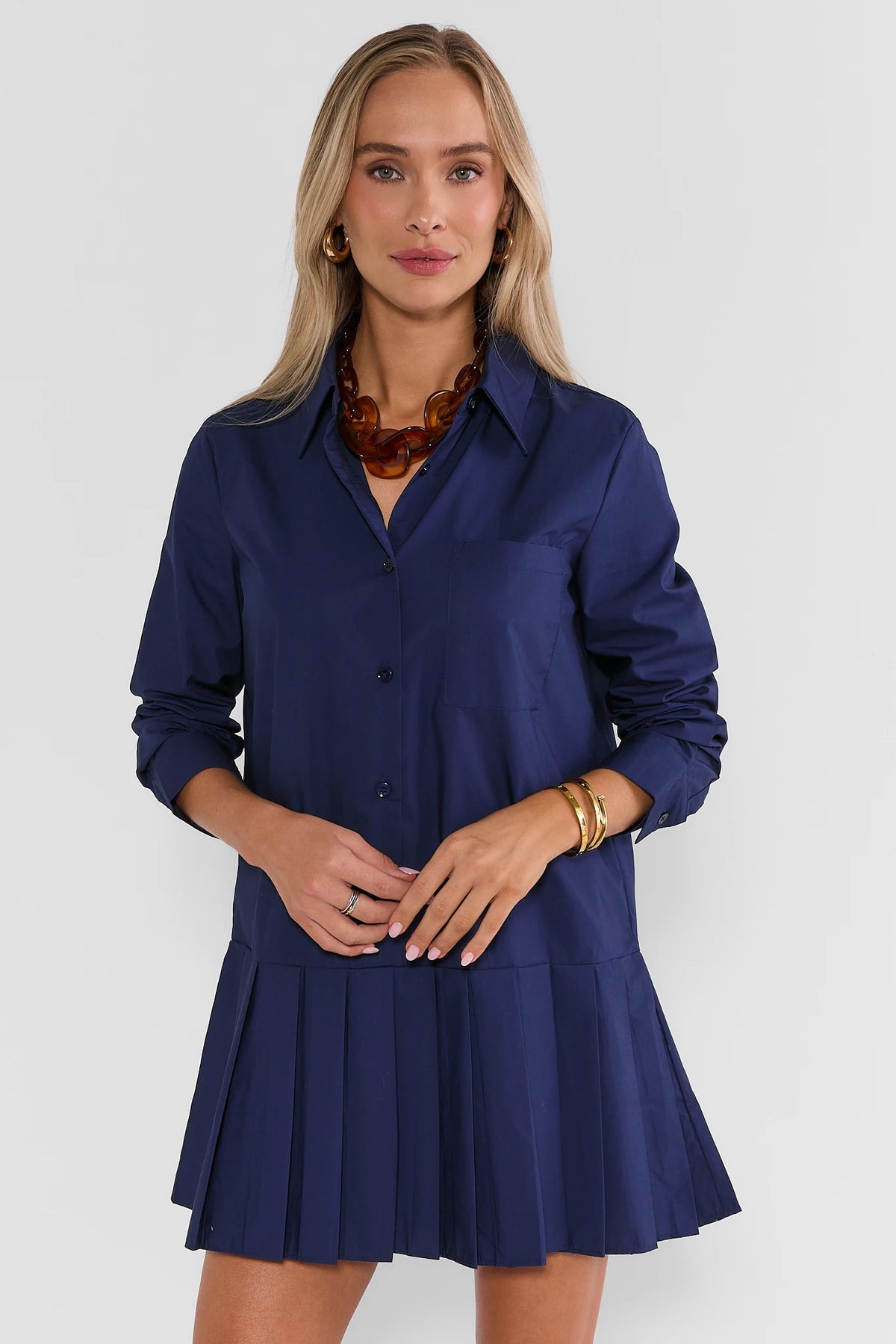 Navy Pleated Skirt Short Dress - Front View On Model, Button-Up Collar | Avara