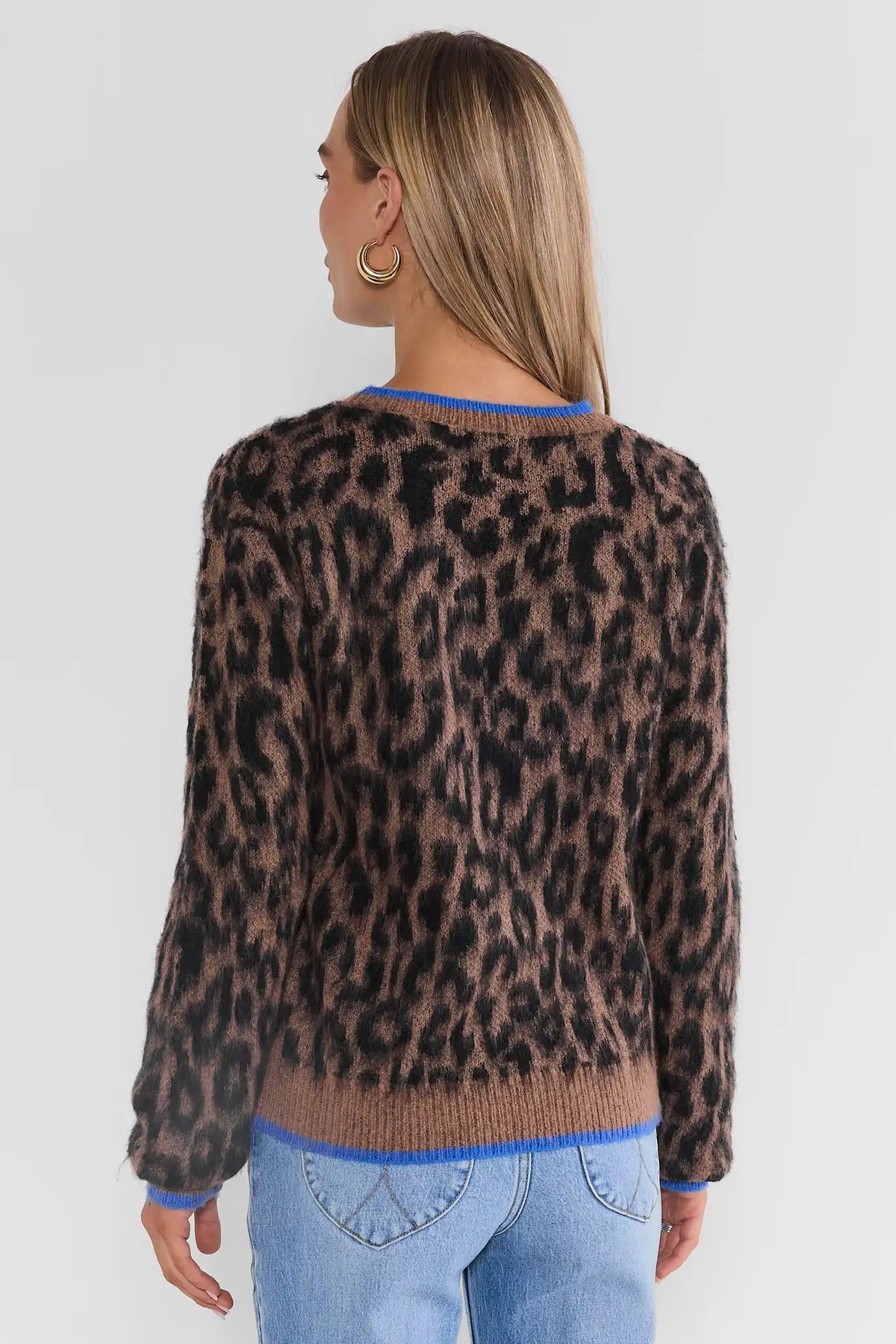 Leopard Print Blue Trim Sweater - Back View On Model with Jeans | Avara