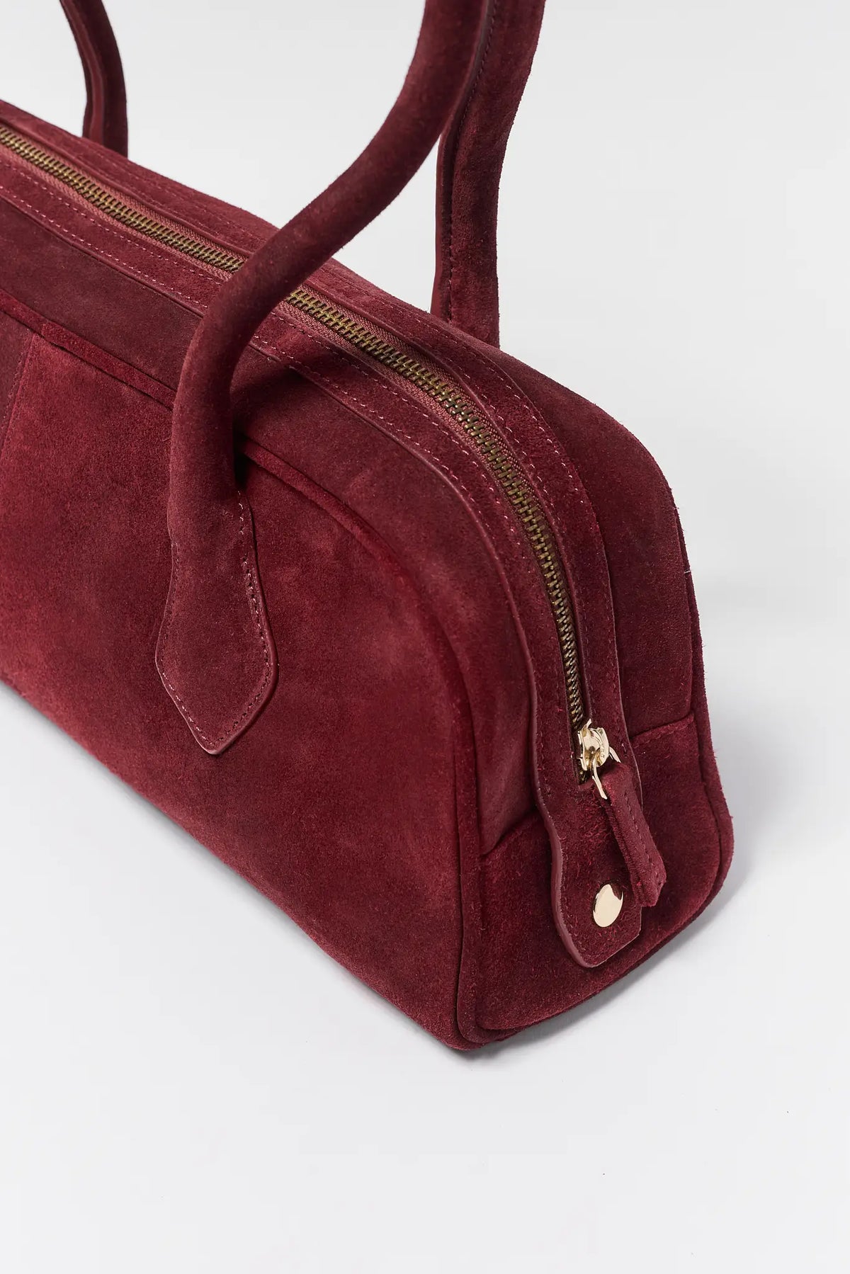 Burgundy Suede Shoulder Bag - Gold Zipper Hardware Close-Up Detail | Avara