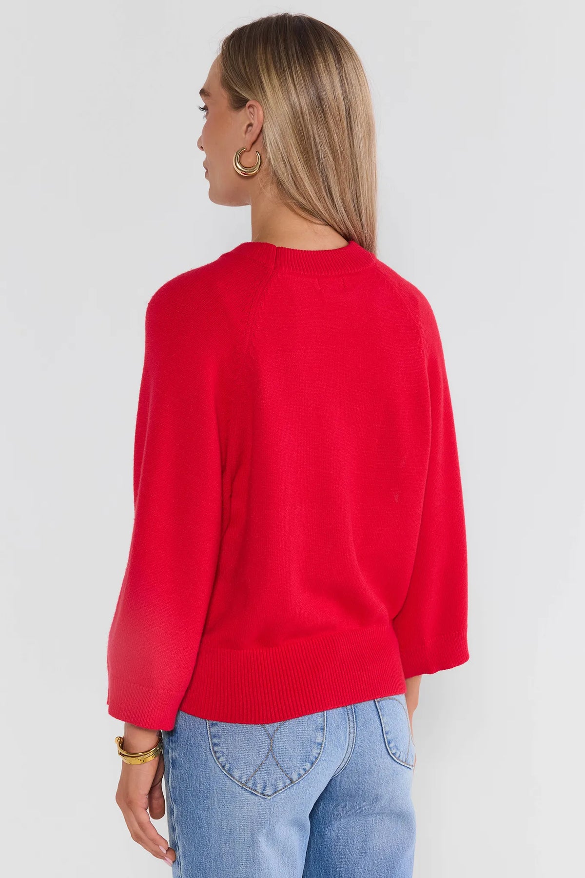 Red Ribbed Waist Sweater - Back View Showing Ribbed Hem and Long Sleeves | Avara