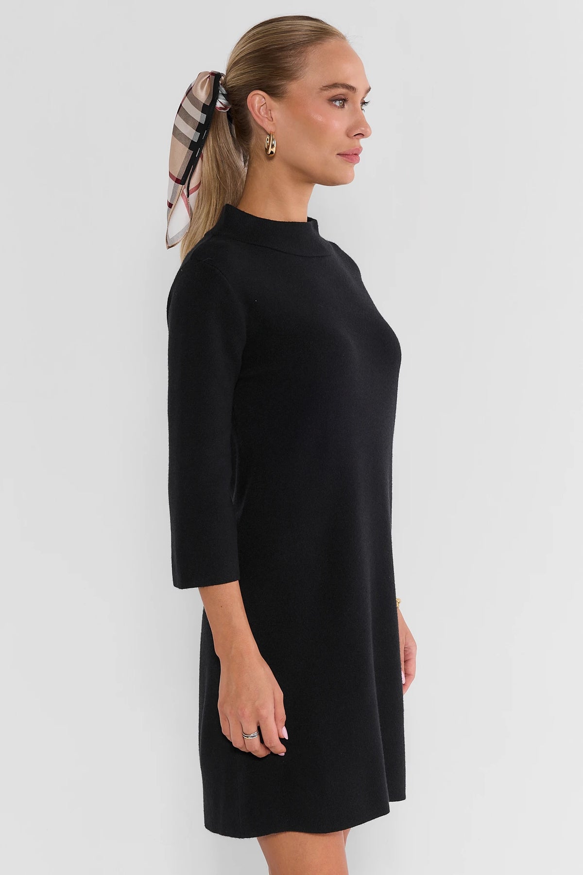 Black Knit Short Dress Mock Neck A-Line Silhouette - Side Profile | Avara