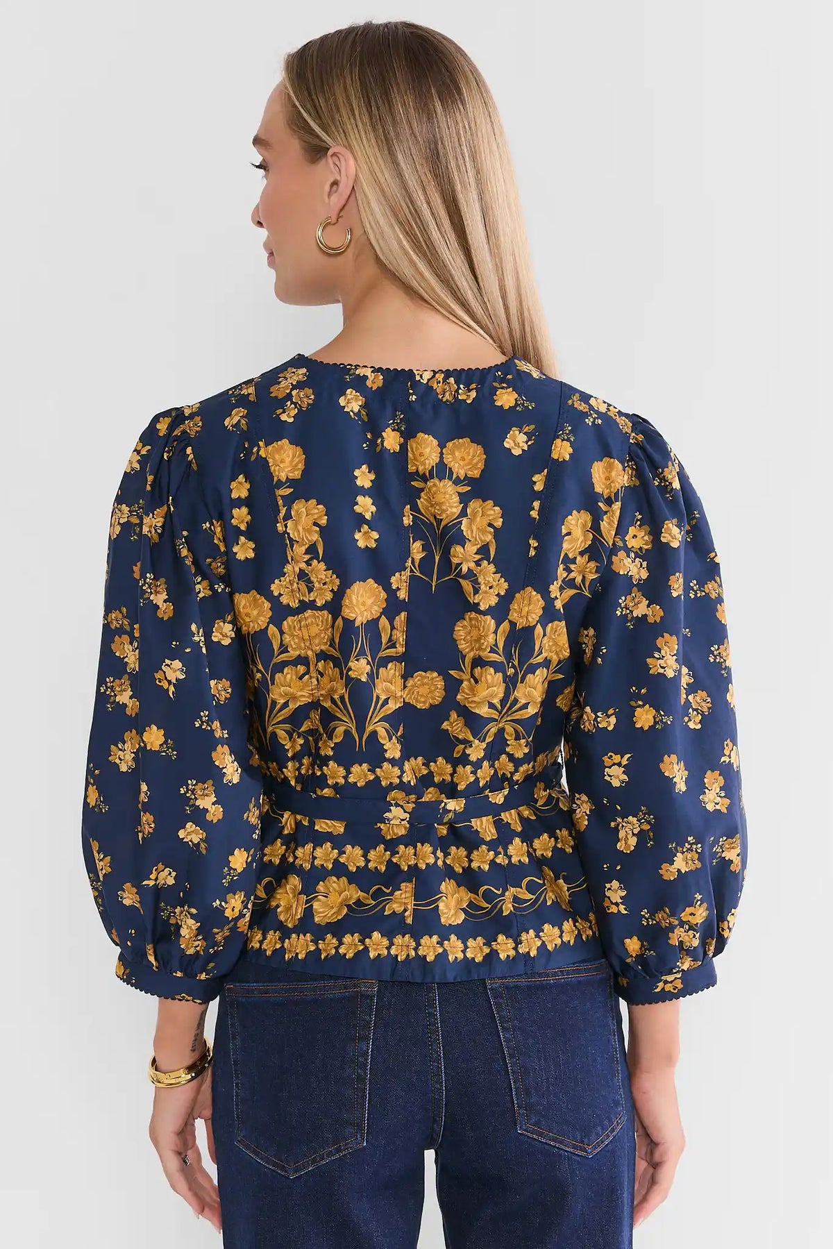 Navy Floral Printed Peplum Top - Back View On Model Styled with Dark Denim | Avara