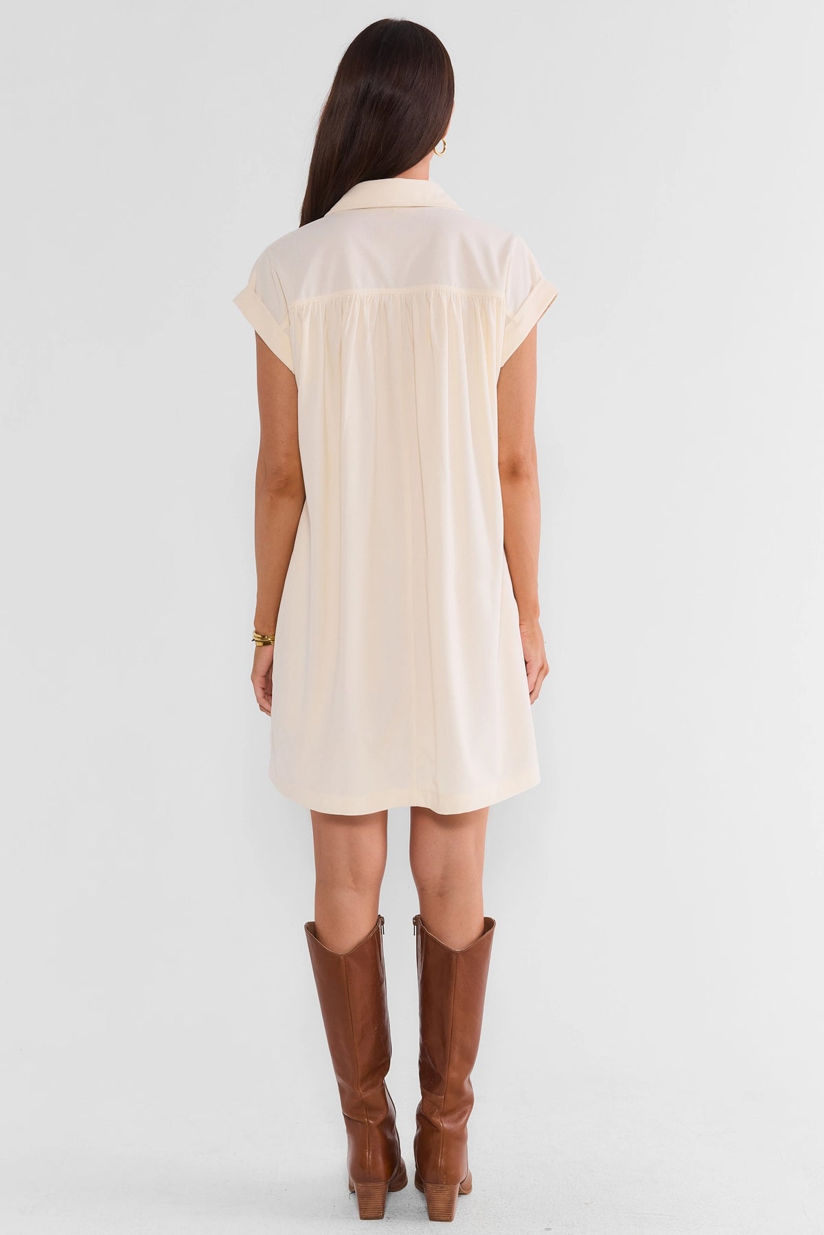 Ivory Corduroy Short Dress - Back View, On Model with Brown Knee-High Boots | Avara