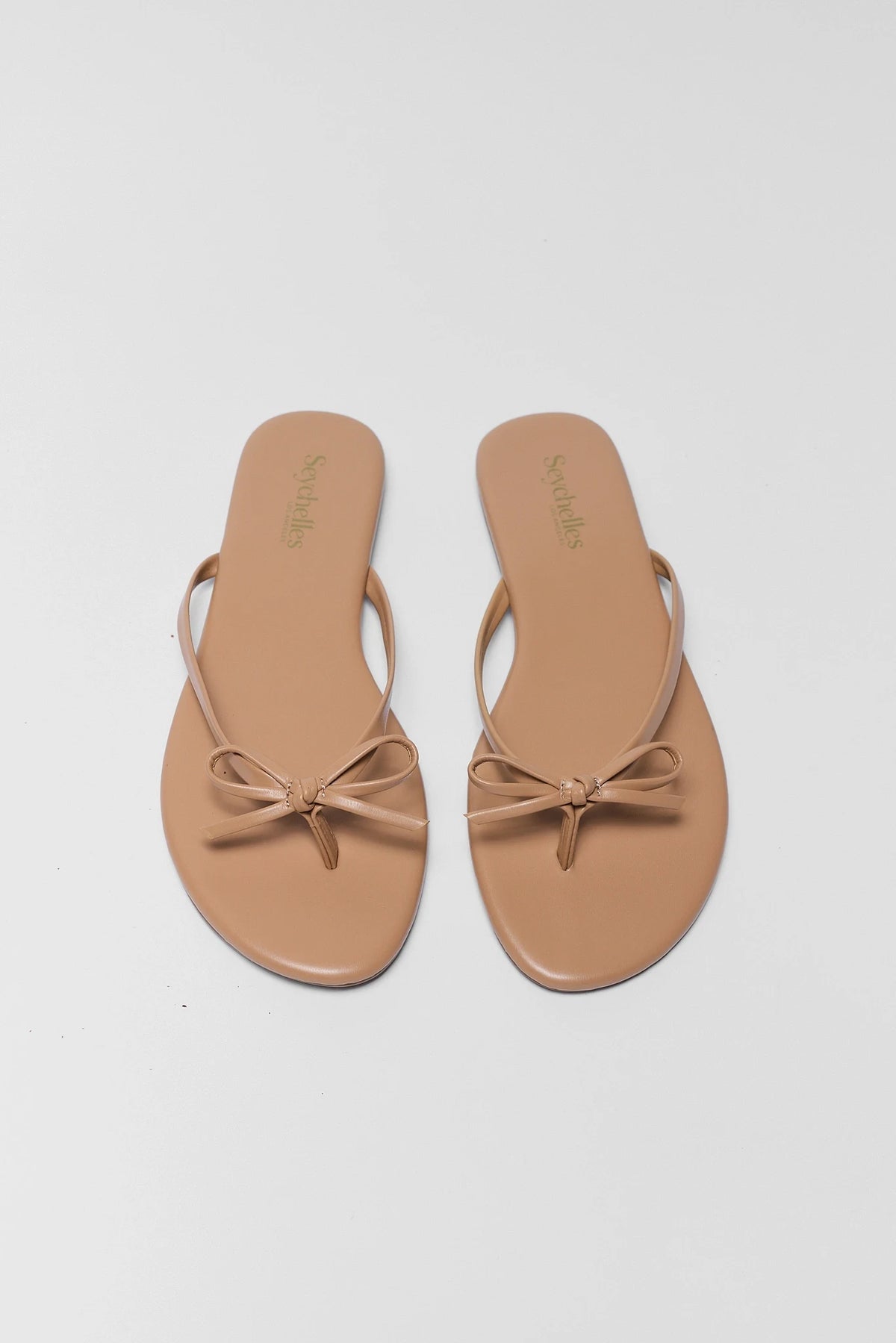 Seychelles Wish List Tan Sandals with bow detail - Overhead Flat Lay View | Avara