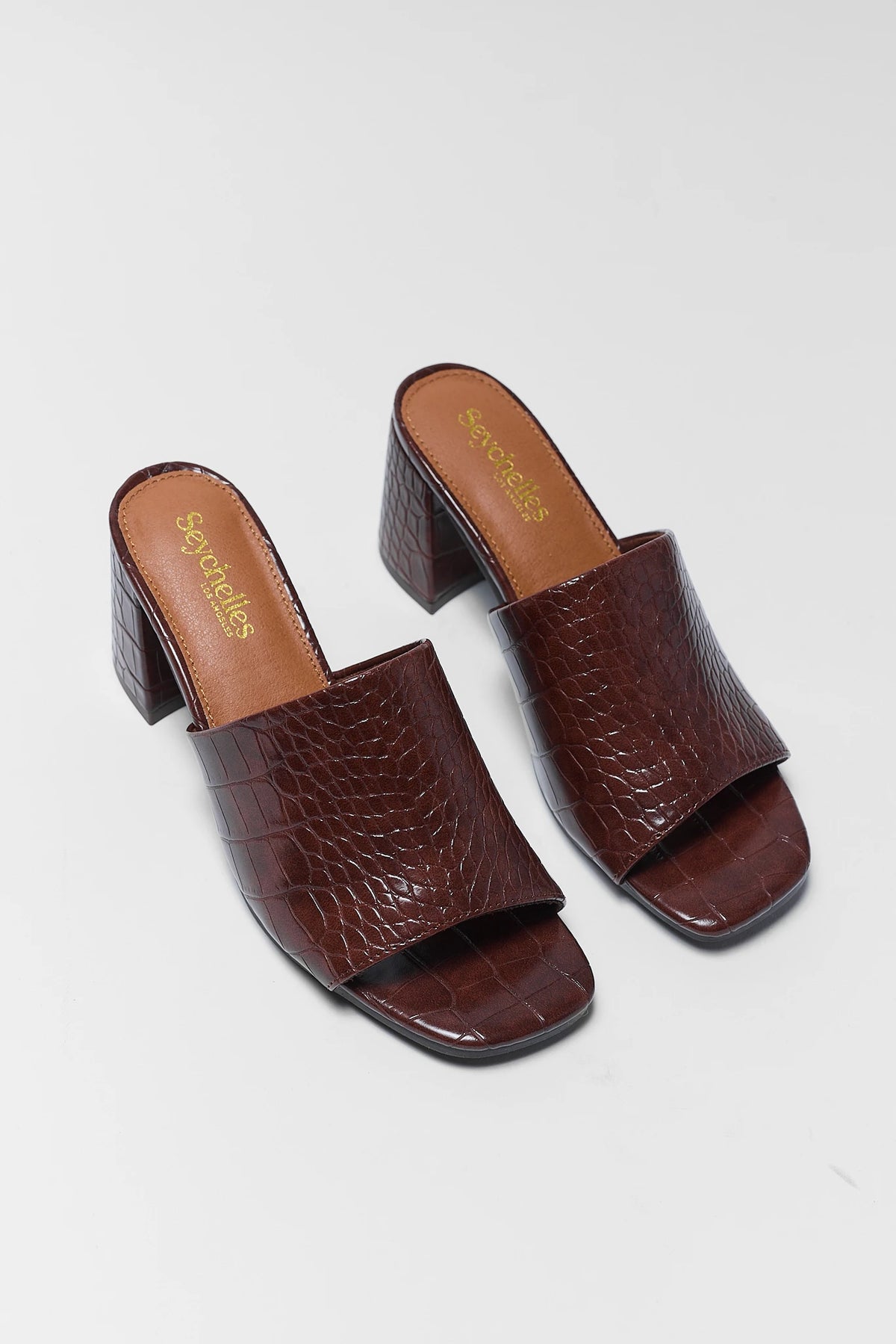 Brown Croc Block Heel Mules Pair - Angled Flat Lay | Avara