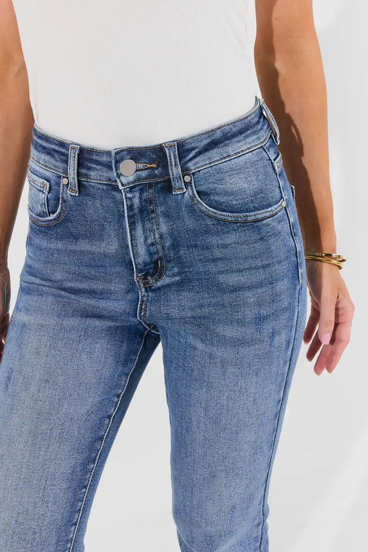 Light Wash Denim Jeans - Mid-Rise Waistband & Button Detail Close-Up | Avara