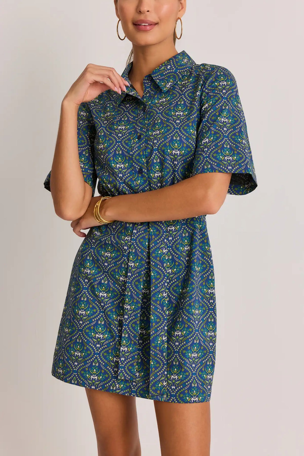 Navy Printed Short Dress - Close-Up Front Detail, Collar and Short Sleeves, Gold Hoop Earrings | Avara