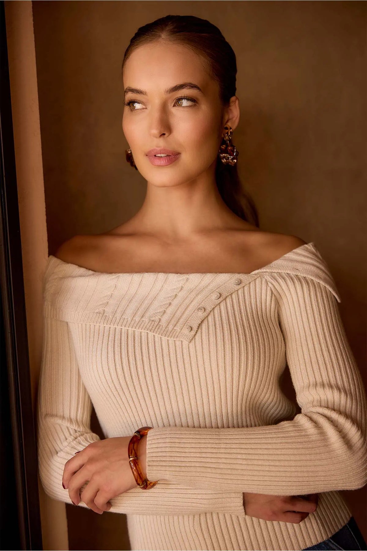 Ashlyn Ribbed Knit Top cream off-shoulder style with cable-knit fold-over neckline and button trim - Upper Detail | Avara