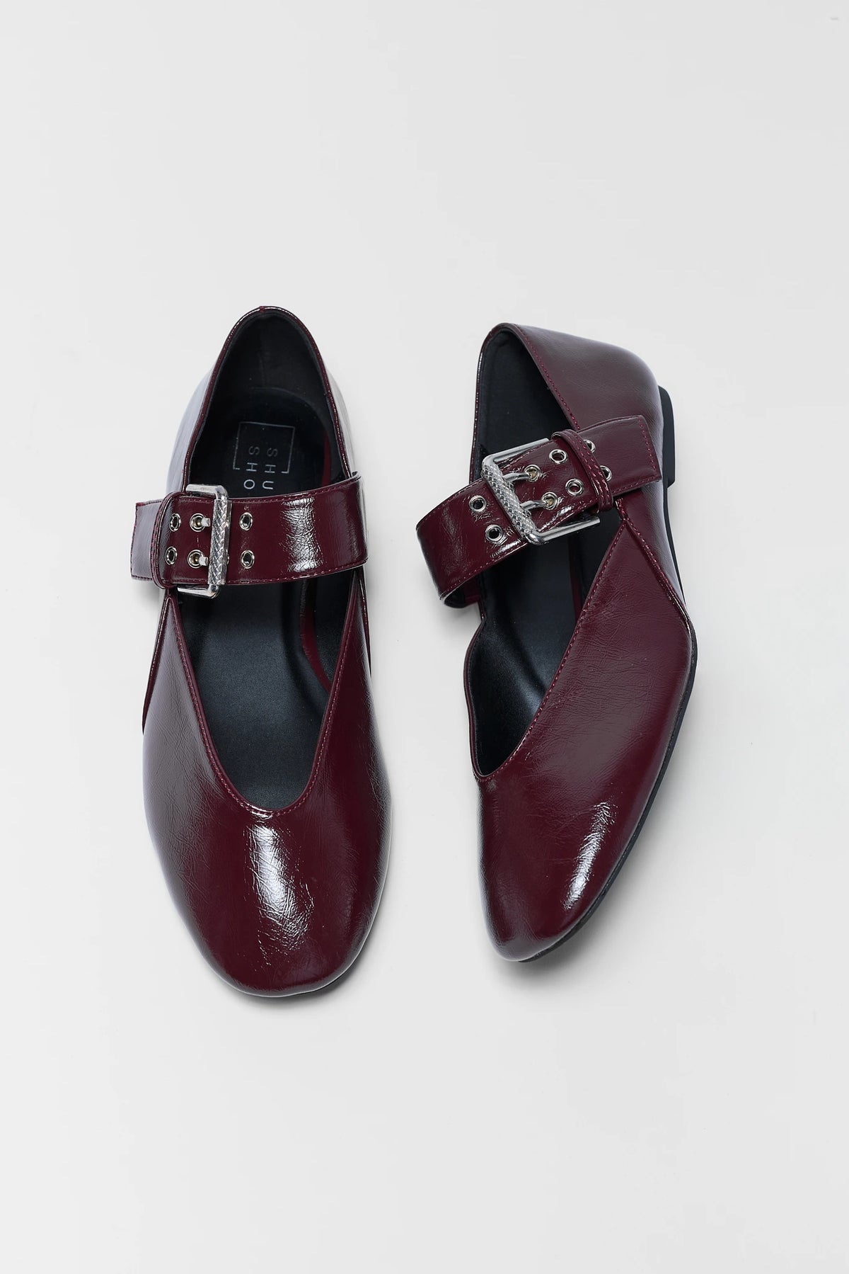 Maroon faux leather Mary Jane flats with silver buckle strap - Top View | Avara