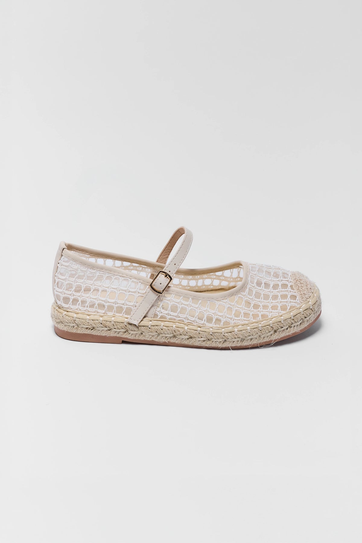 one White lace shoe with espadrille sole on a white background
