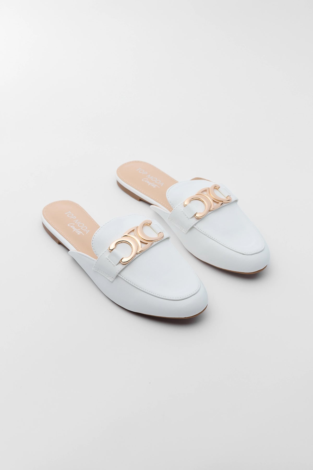 White Bellen Faux Leather Mules with Gold-Tone Detail - Front Toe View | Avara