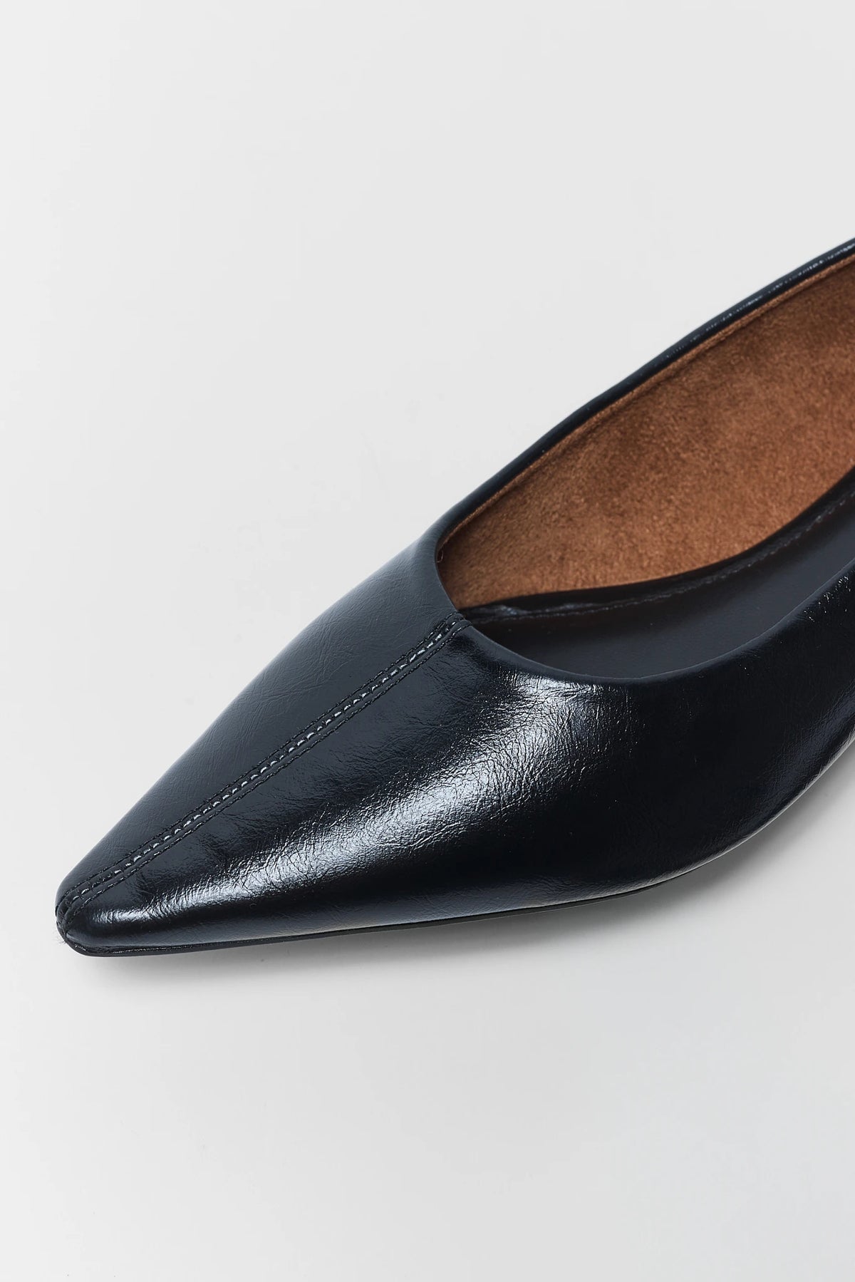 Black Pointed Toe Ballet Flat - Close-Up Toe Detail, Stitched Seam and Glossy Finish | Avara
