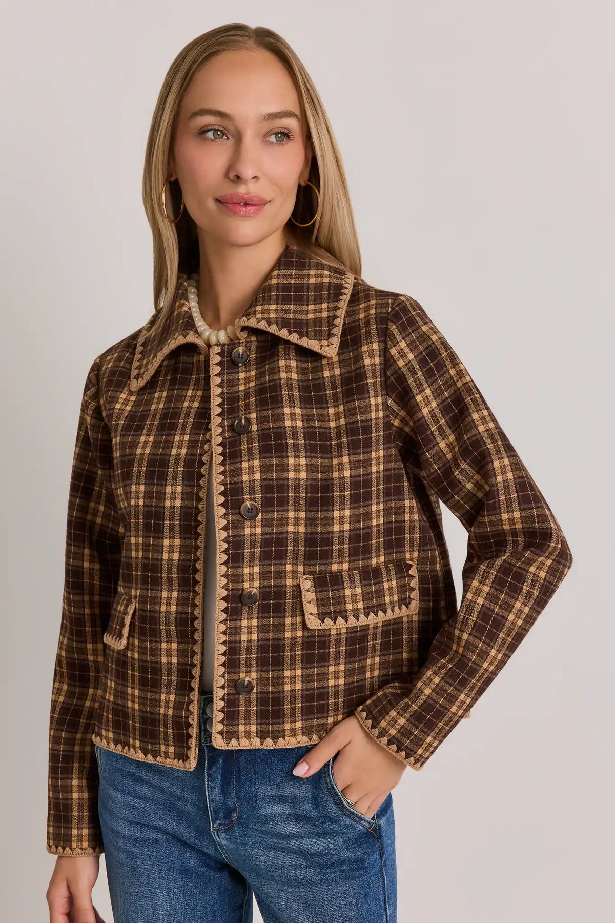Brown Plaid Embroidered Trim Jacket - Front View On Model with Jeans | Avara