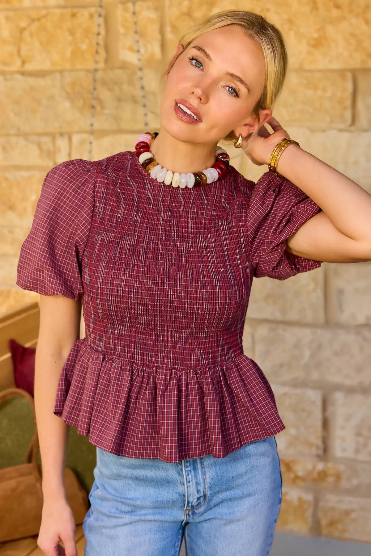 Burgundy Plaid Smocked Peplum Top - Front View On Model with Jeans | Avara
