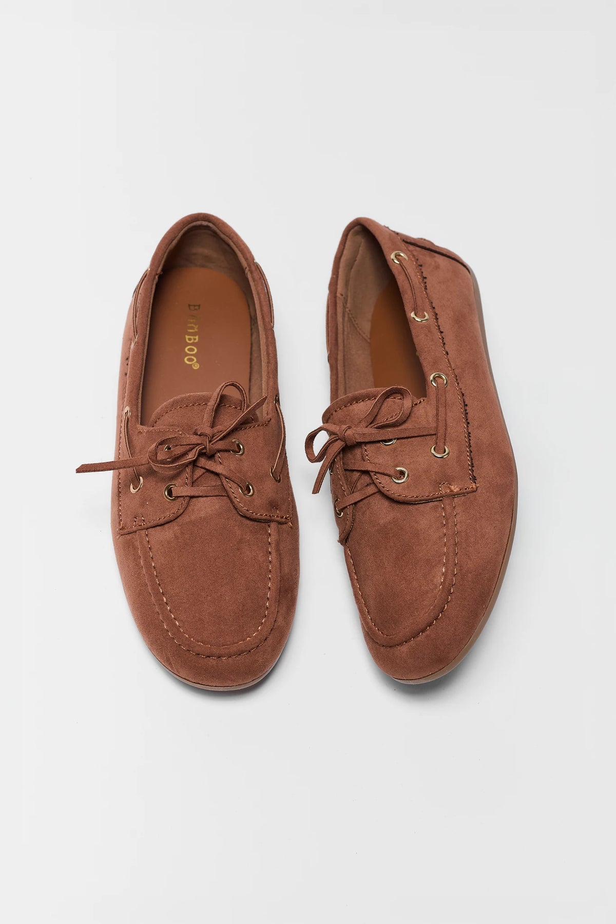 Pair of Camel Faux Suede Boat Shoes - Top Down View, Gold Eyelets | Avara