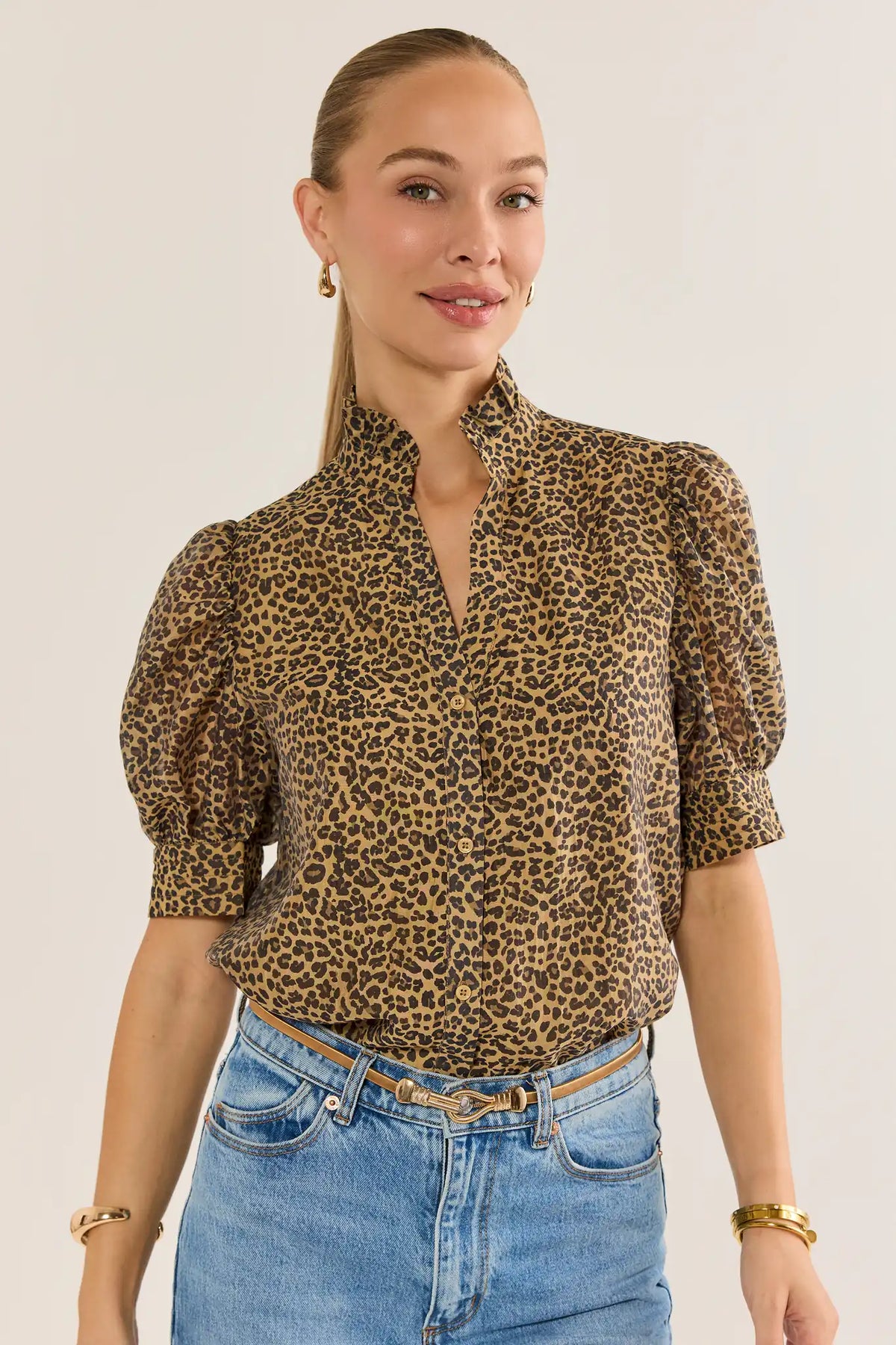 Delaney Leopard Print Button Up Top Tucked and Styled with Belt and Jeans - Front View | Avara