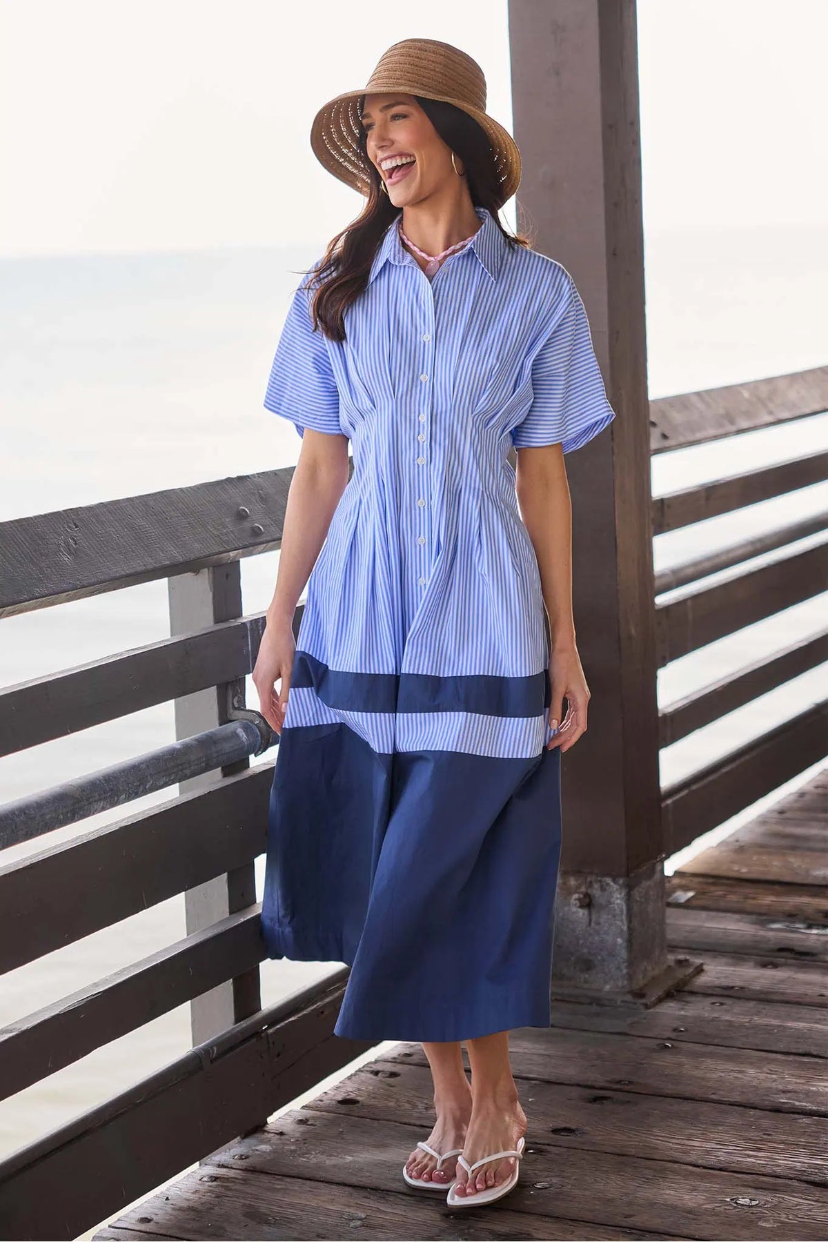 Diana Blue Striped Maxi Dress - Lifestyle Shot on Pier, styled with straw hat and sandals | Avara