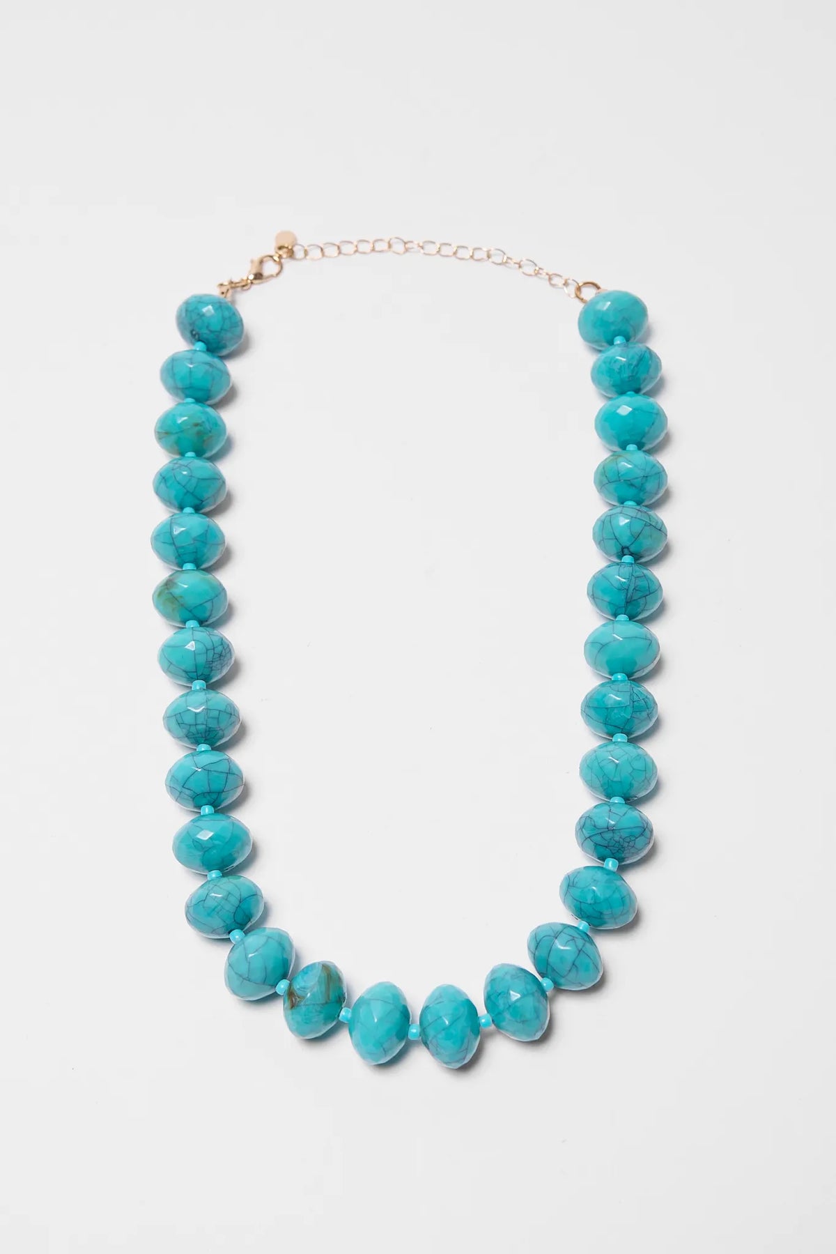 Turquoise beaded necklace with gold-tone clasp, flat lay detail view | Avara