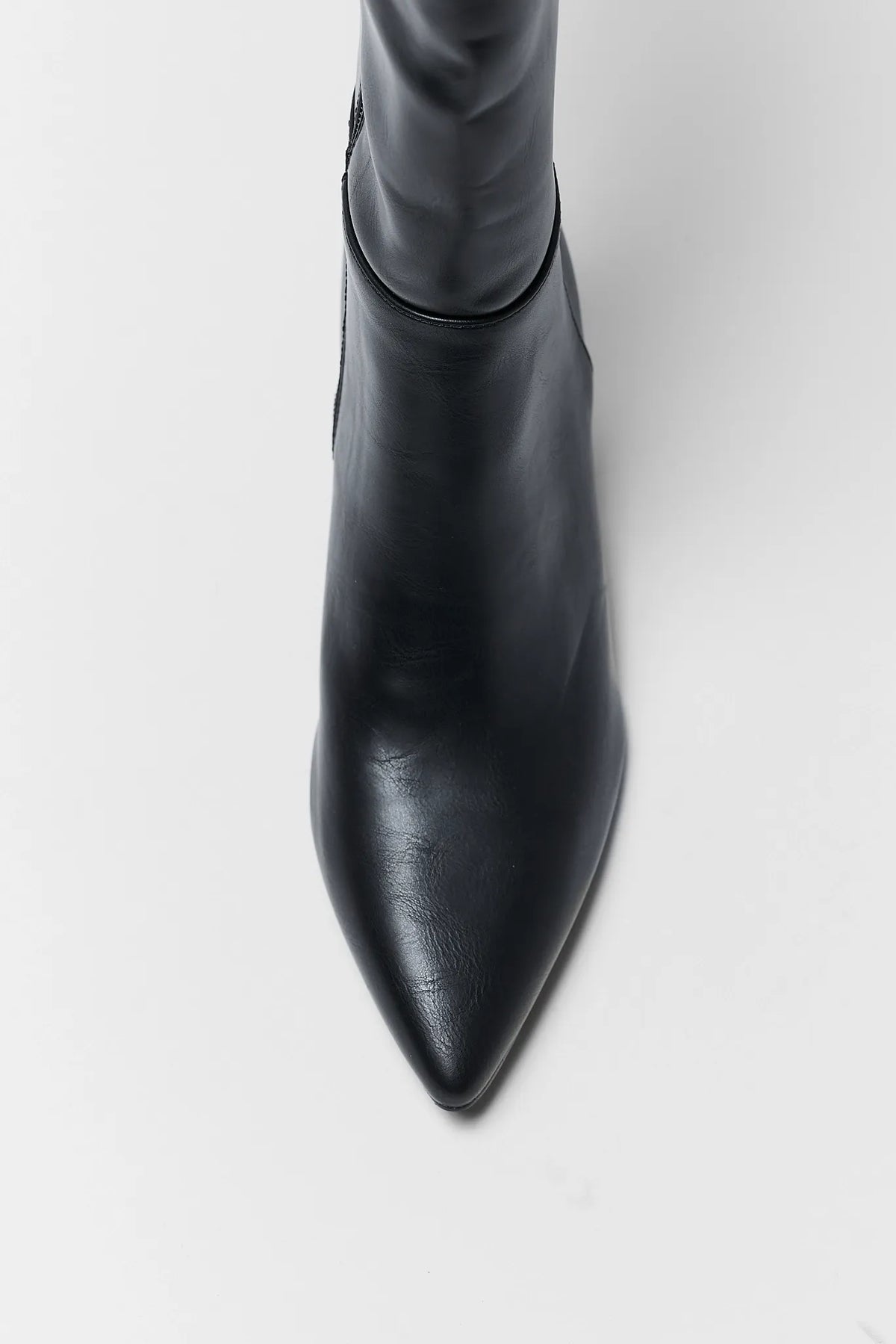 Black Faux Leather Women's Boot - Pointed Toe Close-Up Detail | Avara
