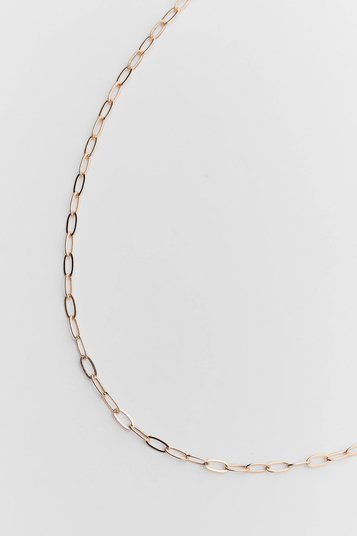 Gold dainty paperclip chain necklace oval link detail - Close-Up | Avara