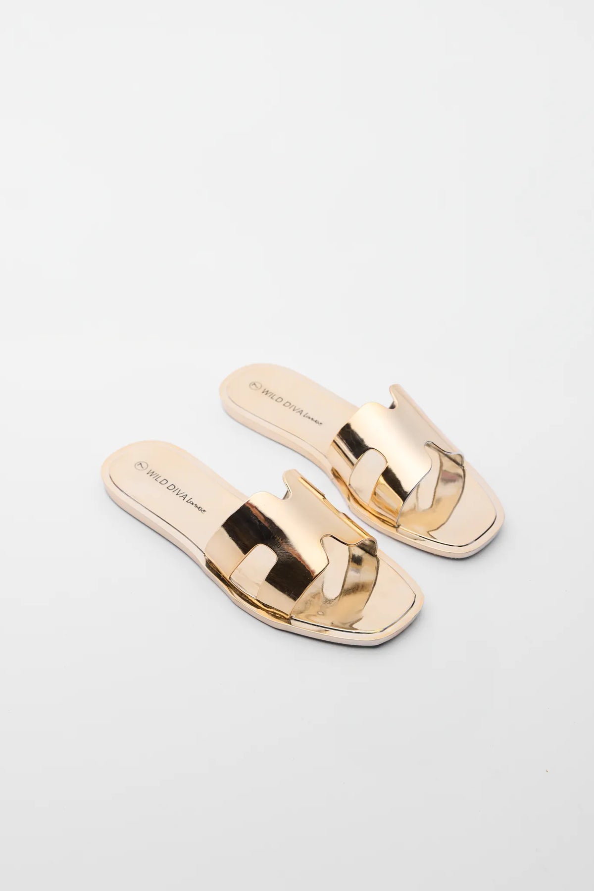 Jaclyn Gold Jelly Sandals - Side Profile, Metallic Slip-On Flat Sandal | Avara