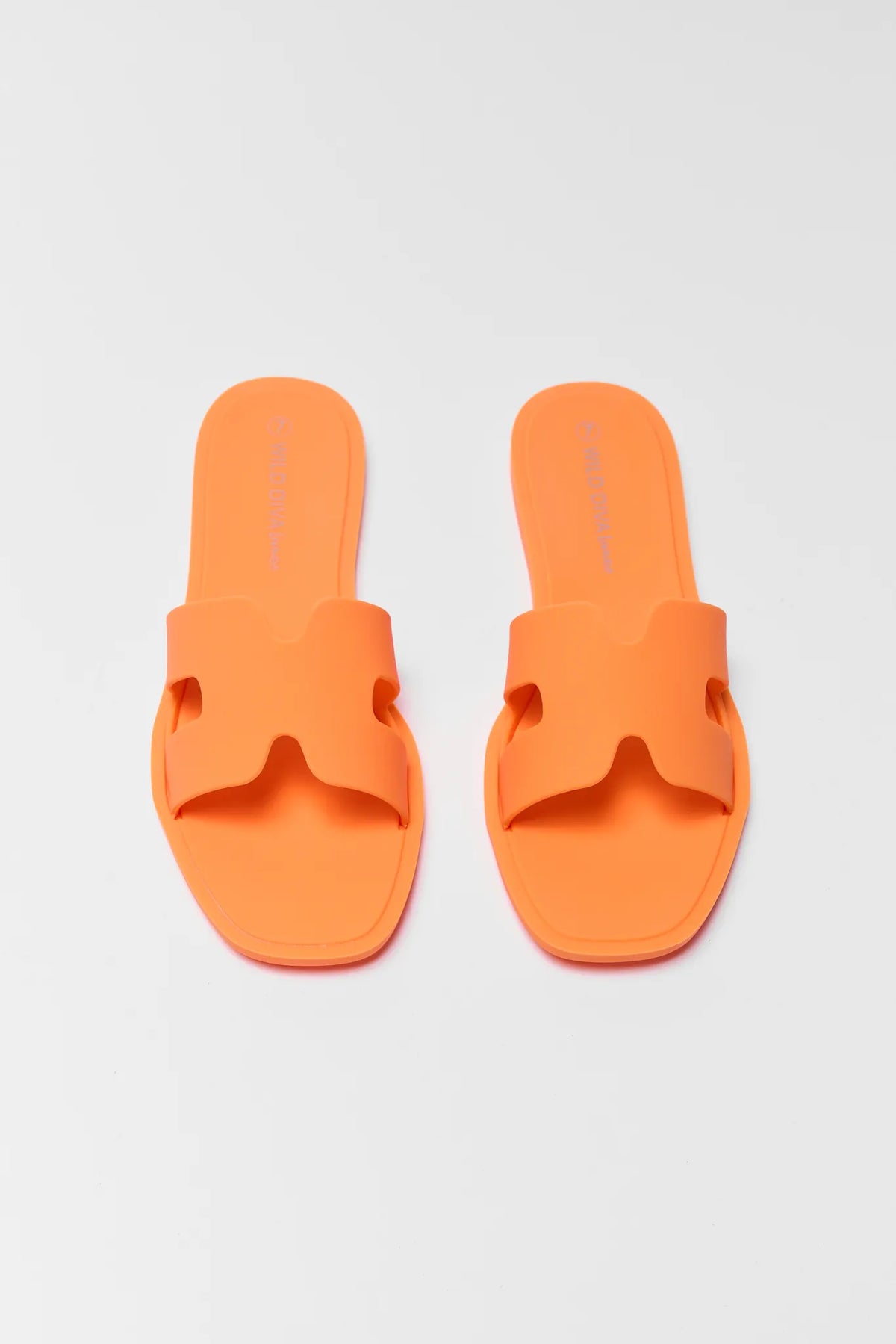 Orange jelly slides for women with cutout H-strap, top-down pair view | Avara