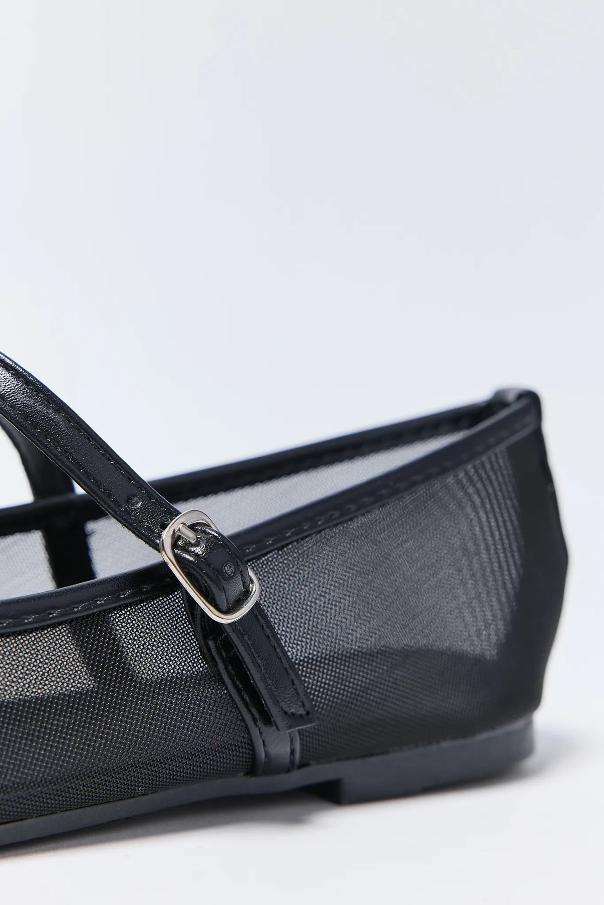 Black mesh Jane Flats silver buckle strap close-up detail | Avara